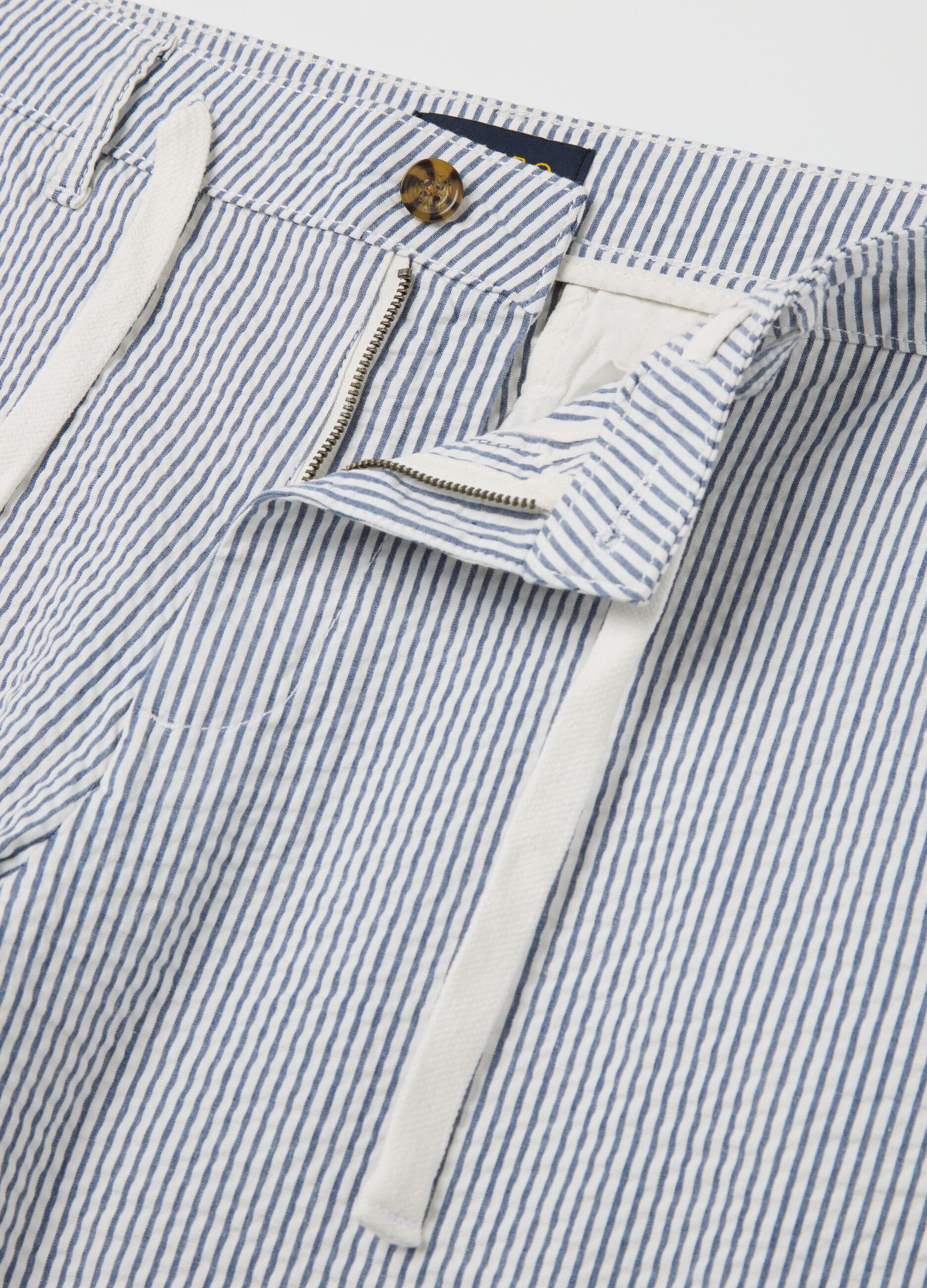 Seersucker chino trousers with white and blue stripes