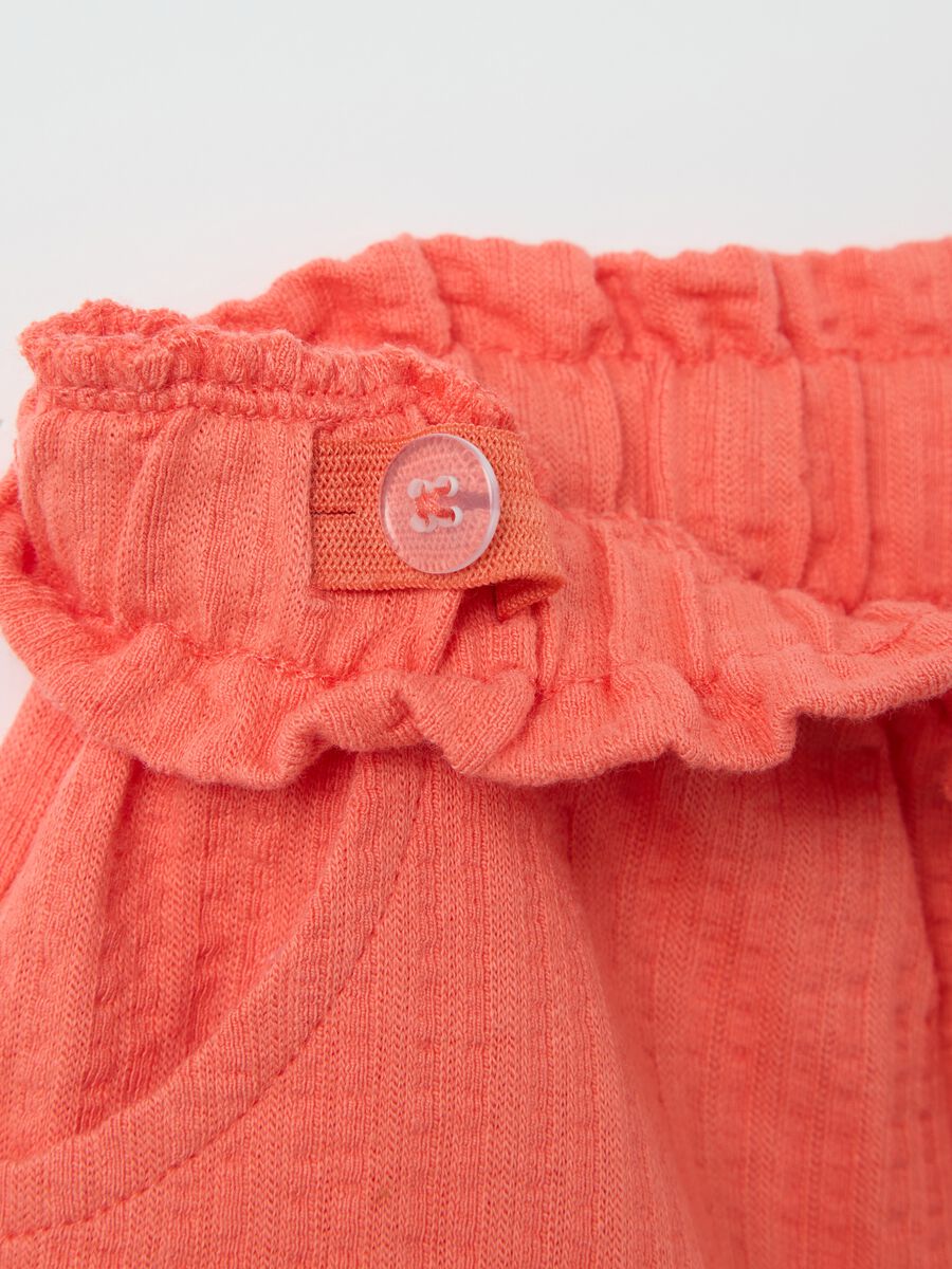 Girls’ shorts in 100% orange cotton with regular fit_2