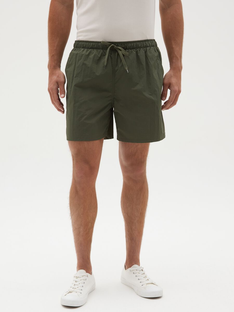 Pantaloncini da uomo in puro nylon verde con coulisse_1
