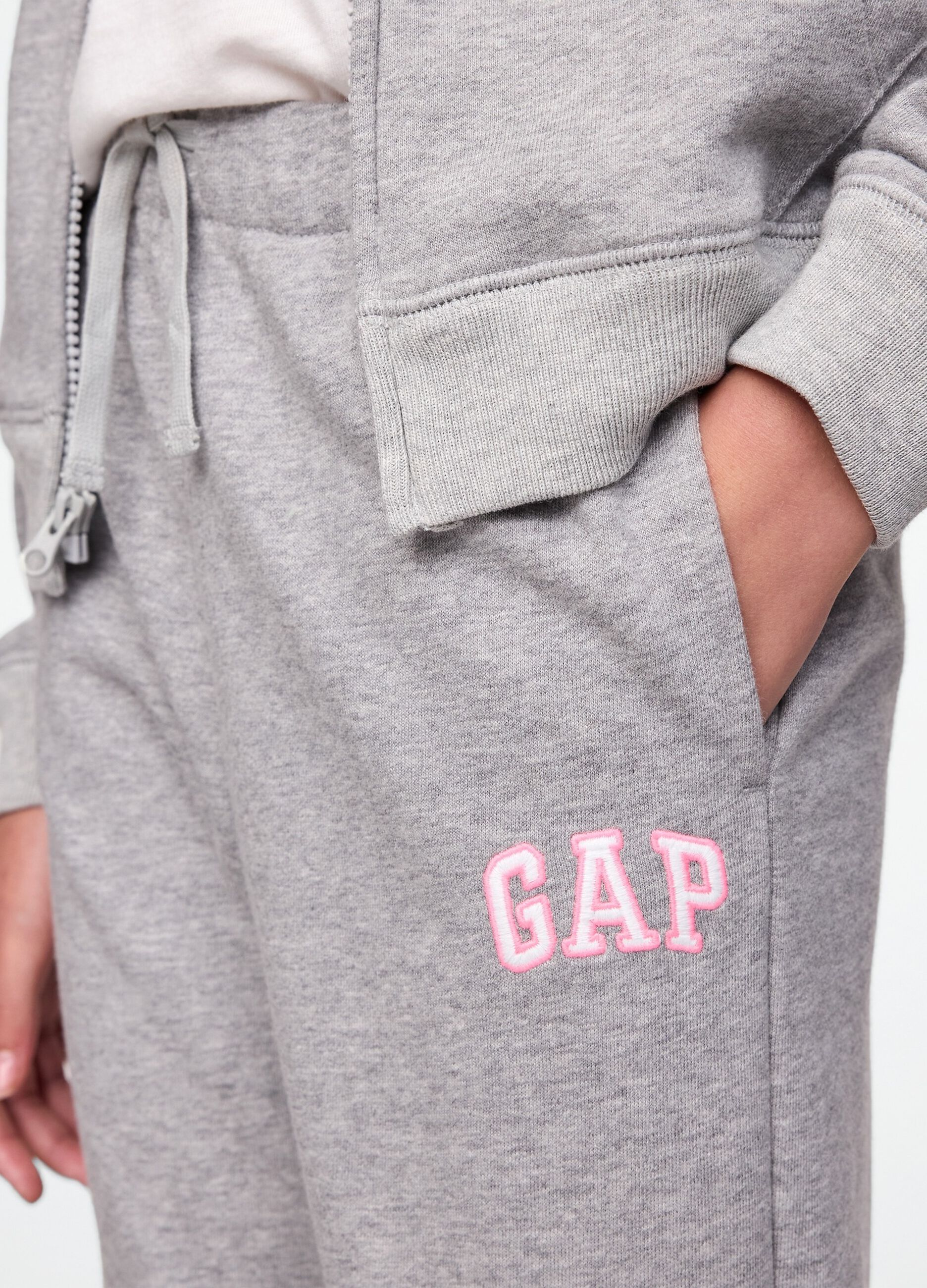 Grey joggers with drawstring and logo patch