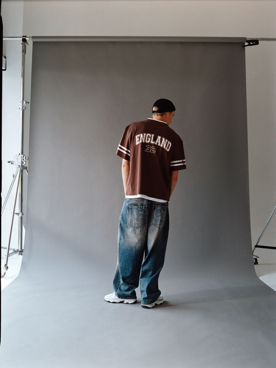 Low-rise blue jeans in pure cotton denim_0