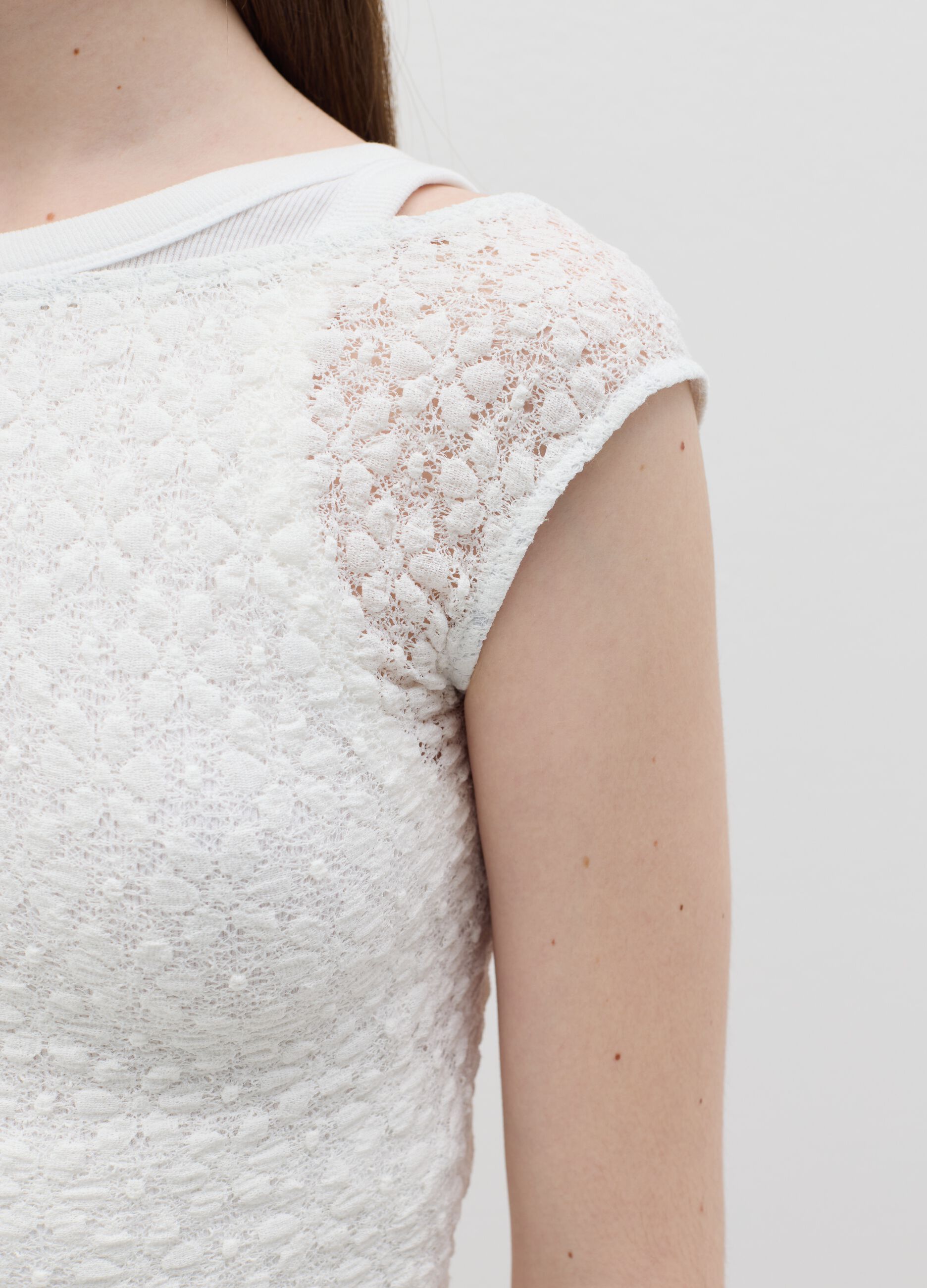 Lace-effect sleeveless top
