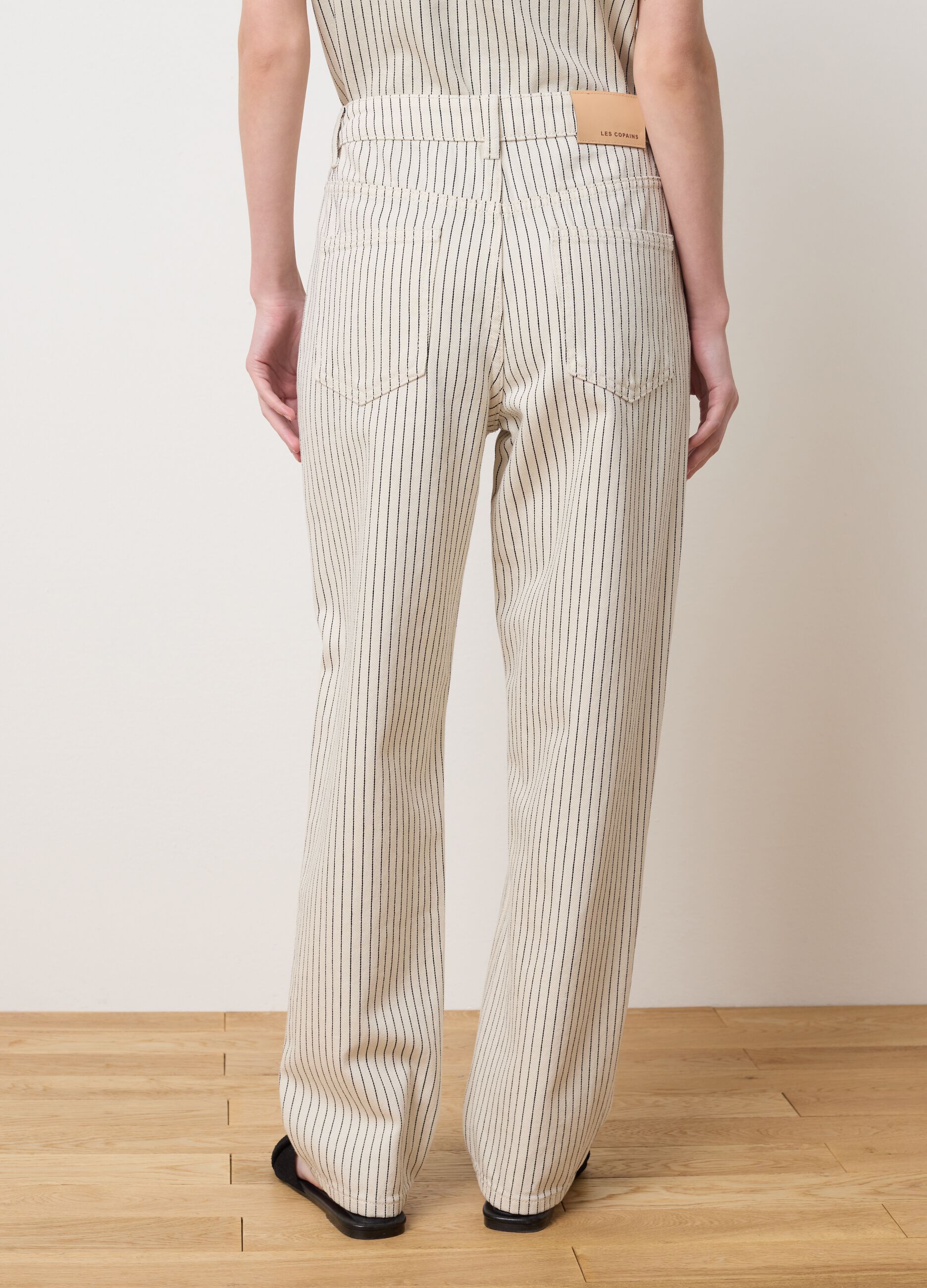 Carrot fit pinstripe jeans.