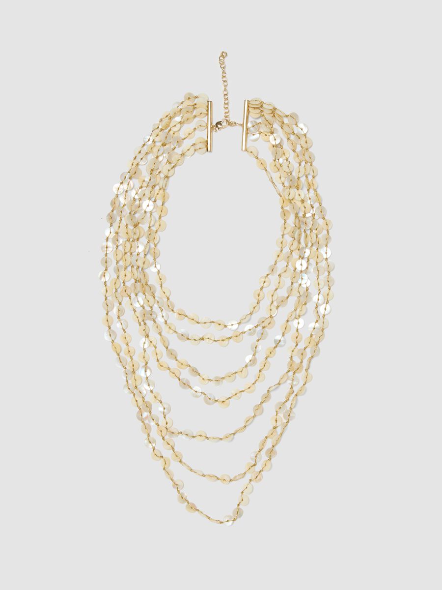 Beige multi-strand necklace with pearlescent discs_0
