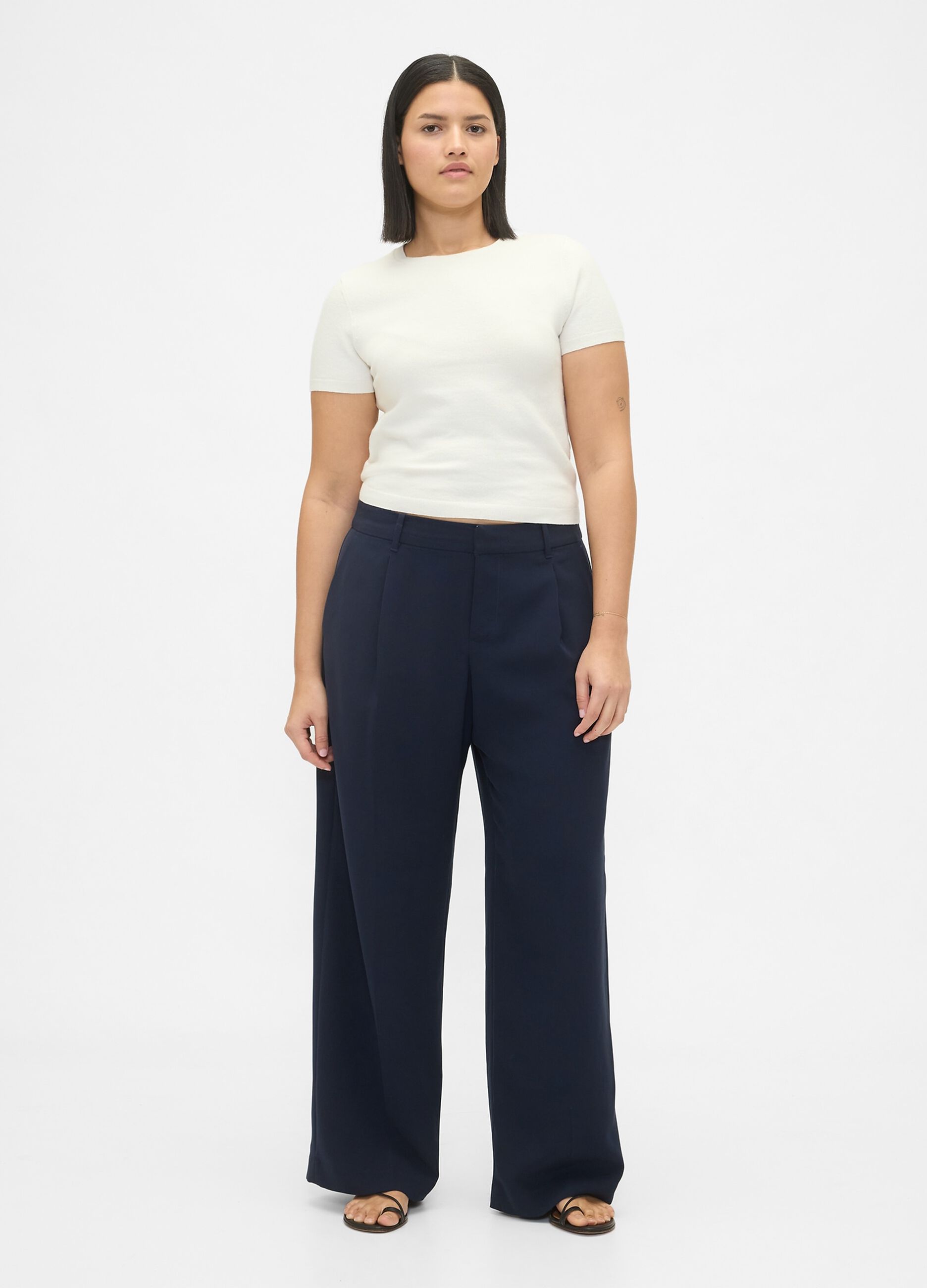 Pantaloni blu a gamba larga in tessuto elasticizzato
