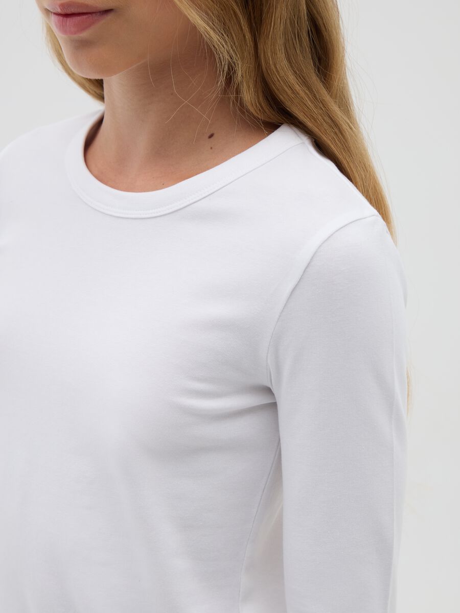 T-shirt da ragazza a maniche lunghe bianca in tessuto elasticizzato_1