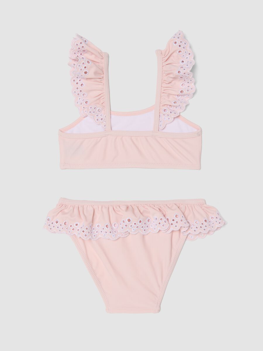 Bikini rosa in tessuto elasticizzato con volant_1