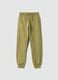 Green cotton-blend trousers with cuffed hems_0