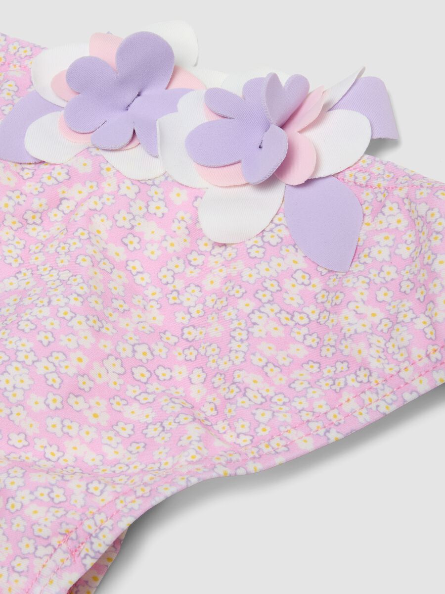 Pink stretch swim briefs with applied floral details_3
