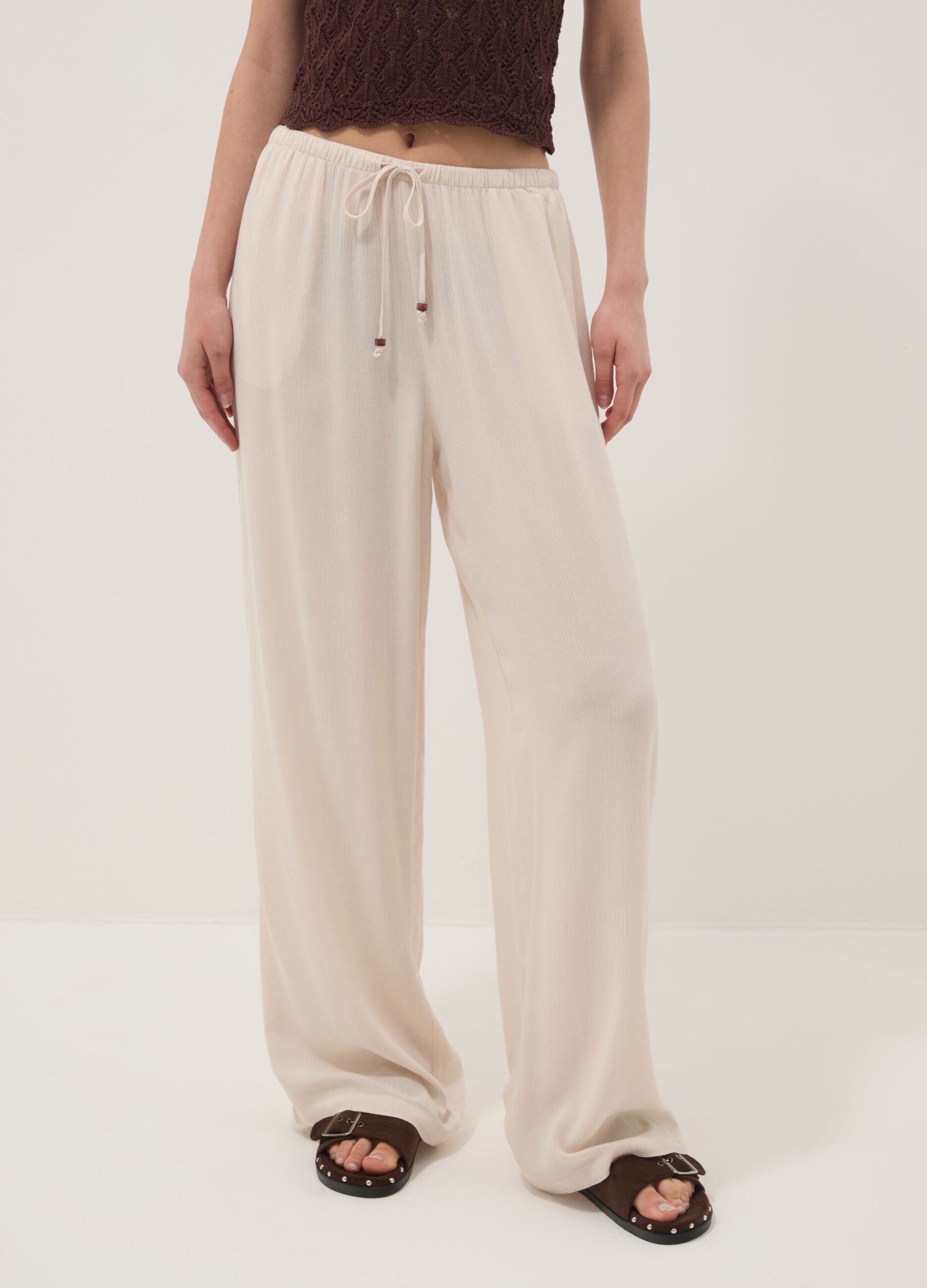Beige palazzo trousers in pure viscose