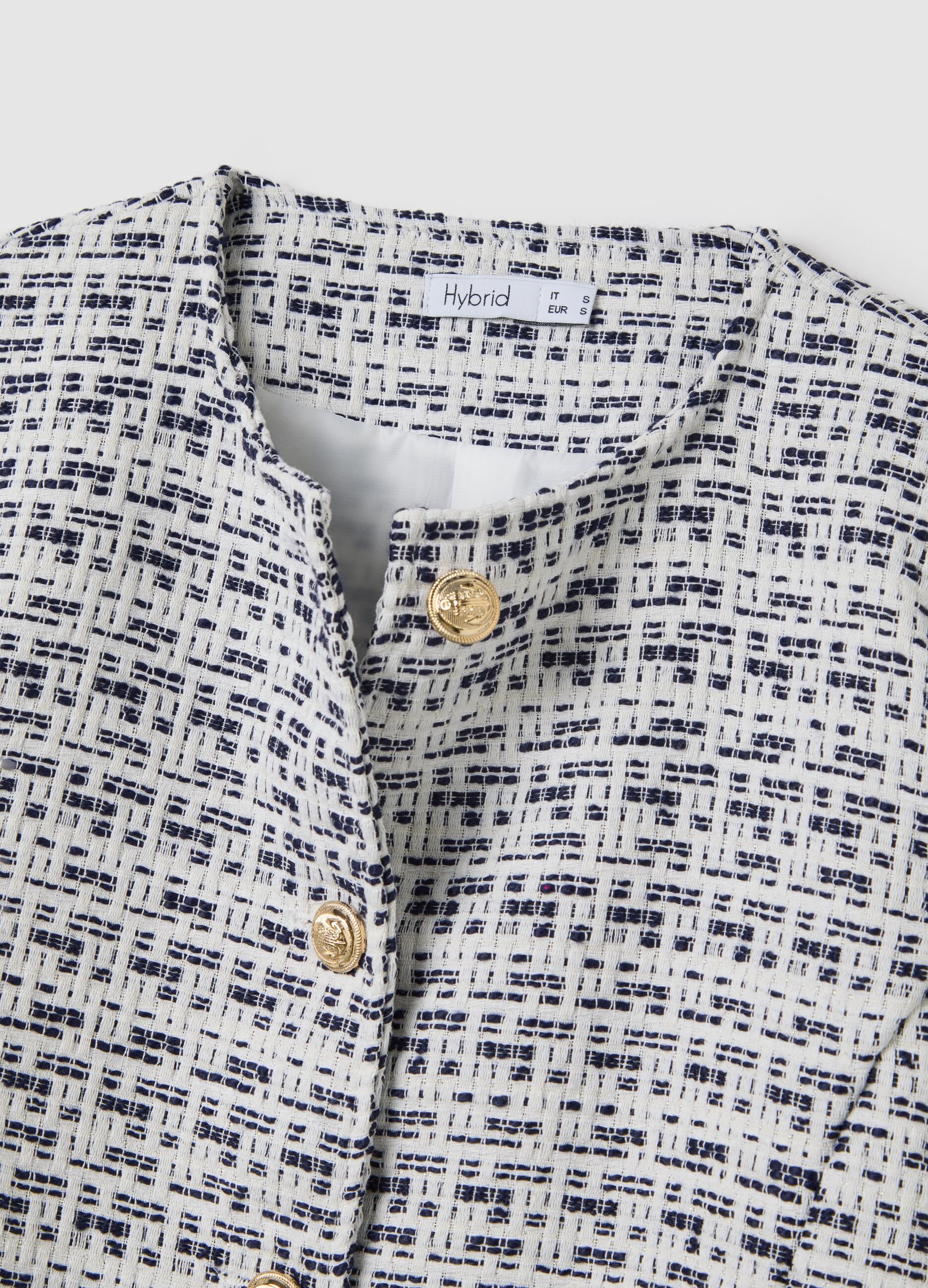 Short black and white jacket in tweed