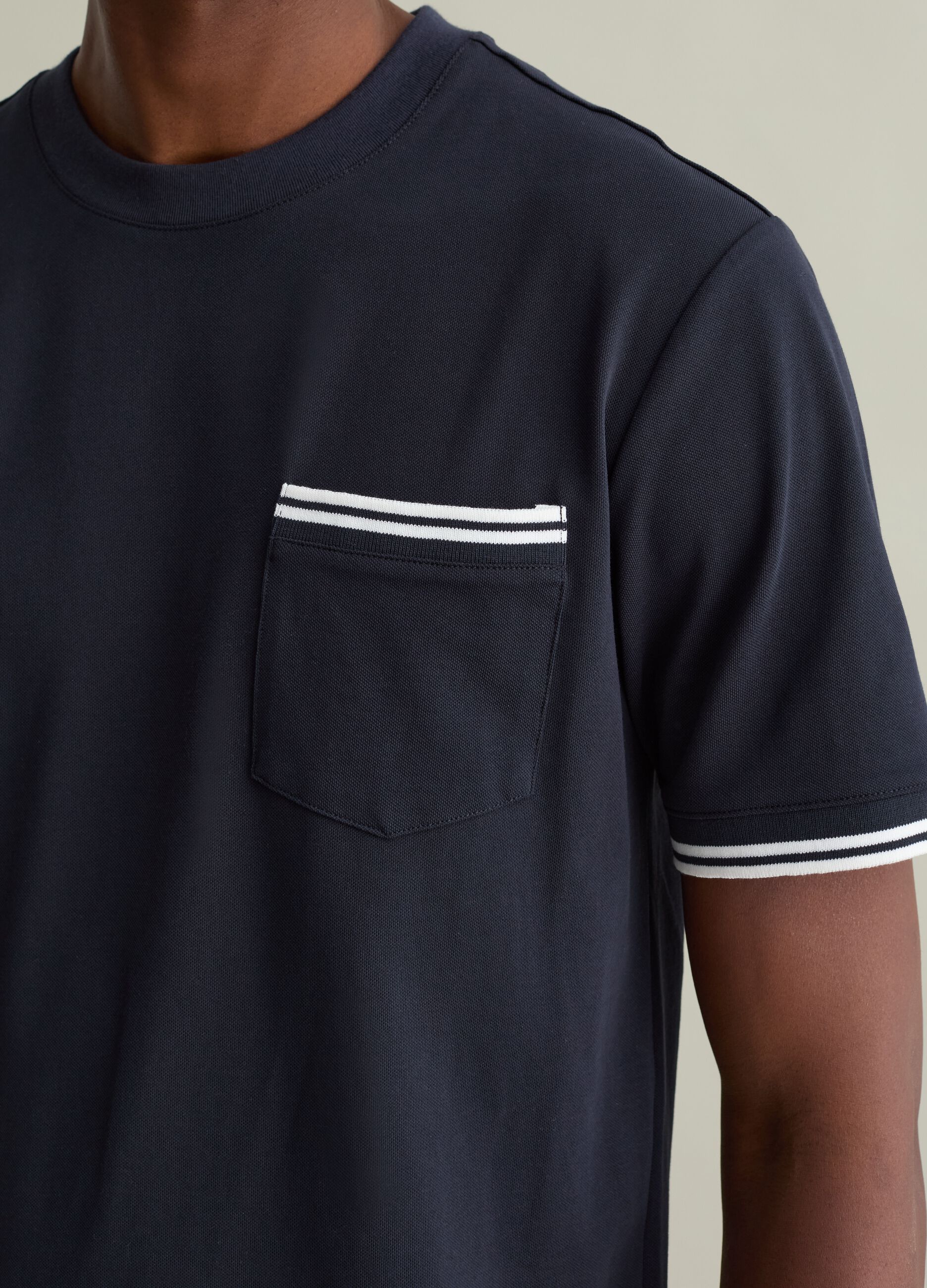 T-shirt with striped details and pocket