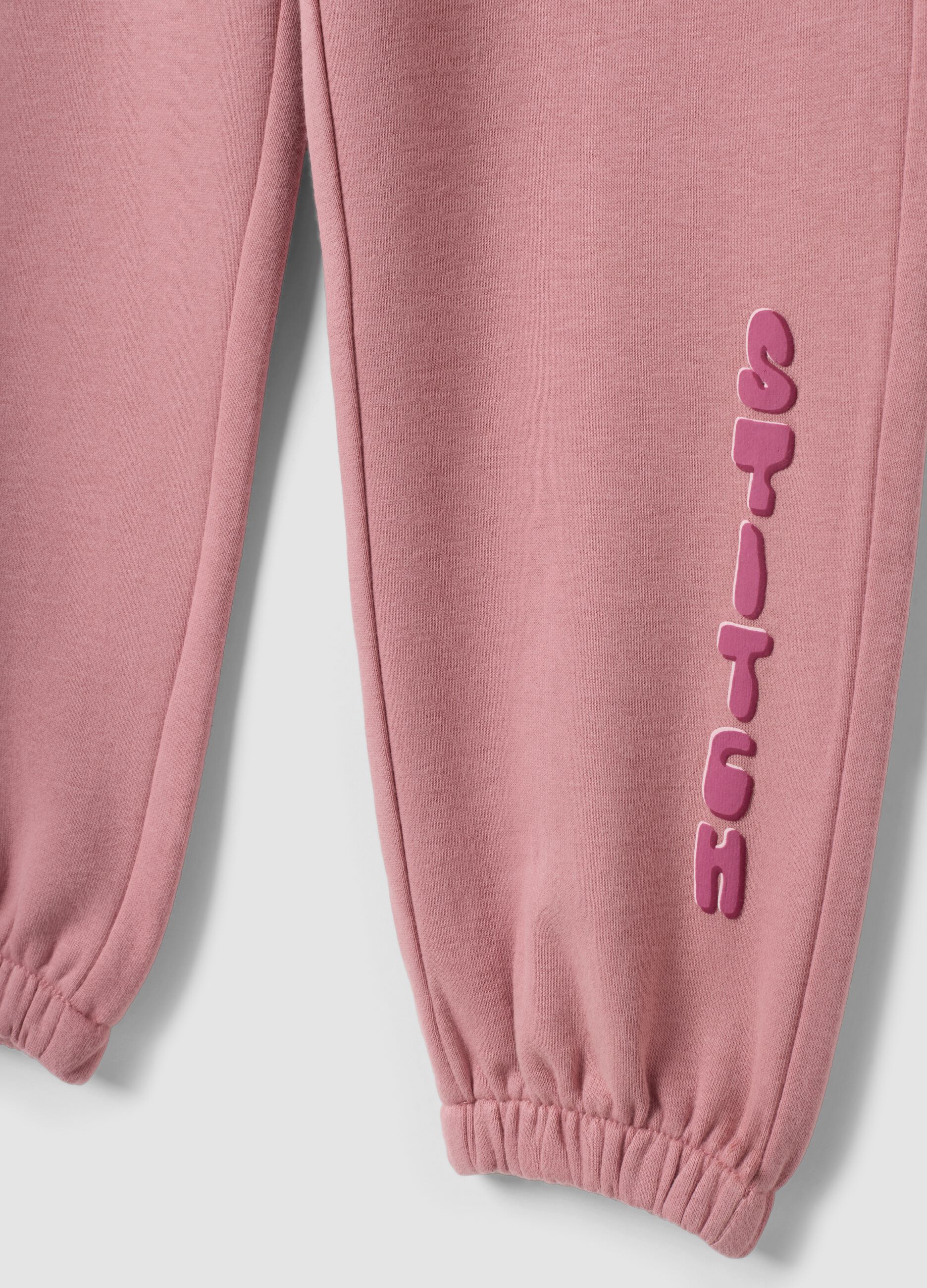 Tuta rosa in misto cotone con girocollo e stampa Stitch