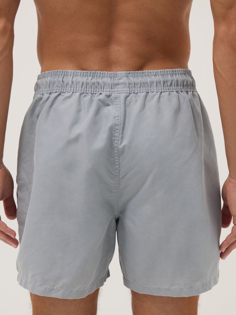 Blue swim shorts with drawstring waist_2