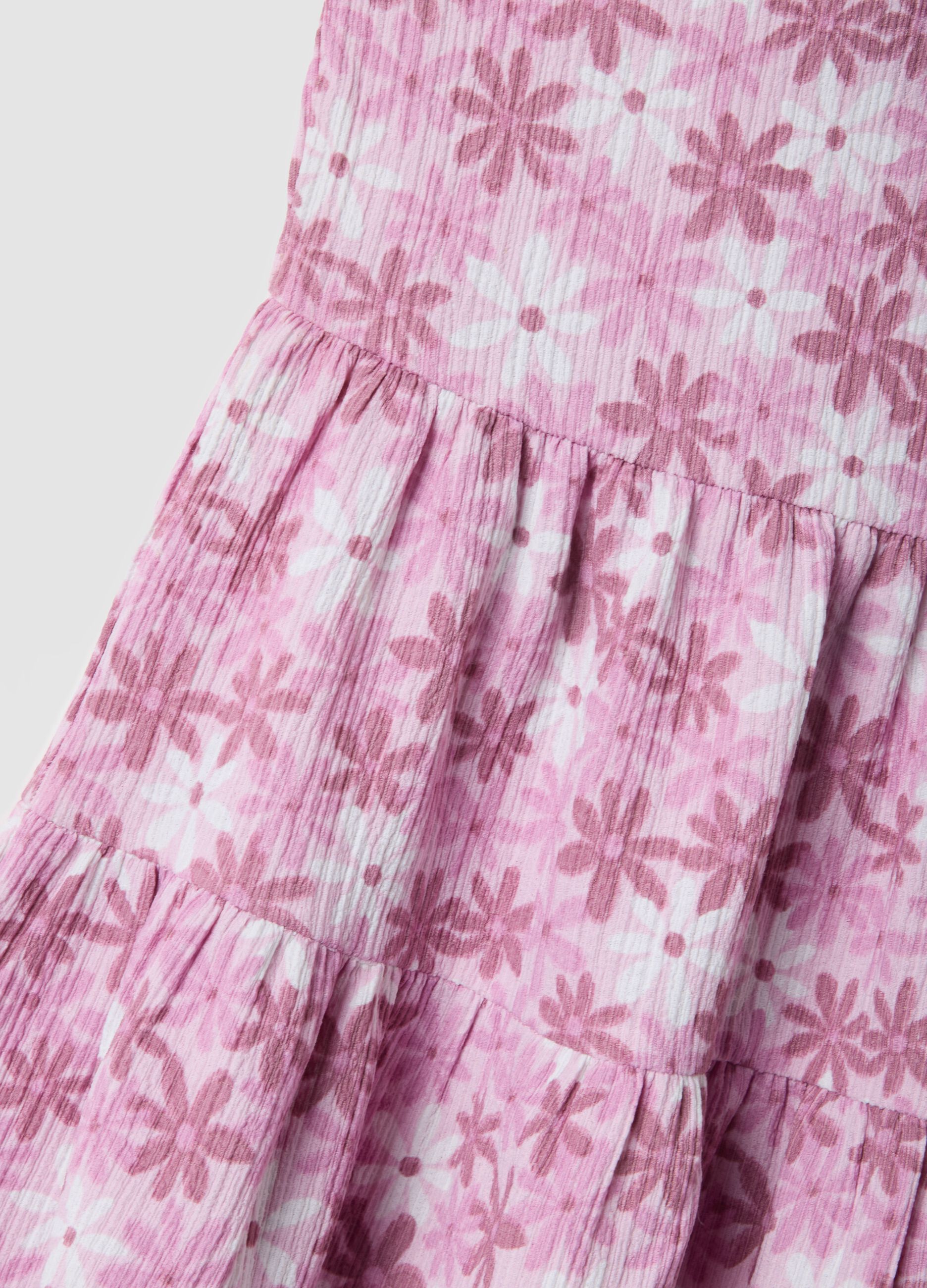 Pink sleeveless stretch dress with floral print