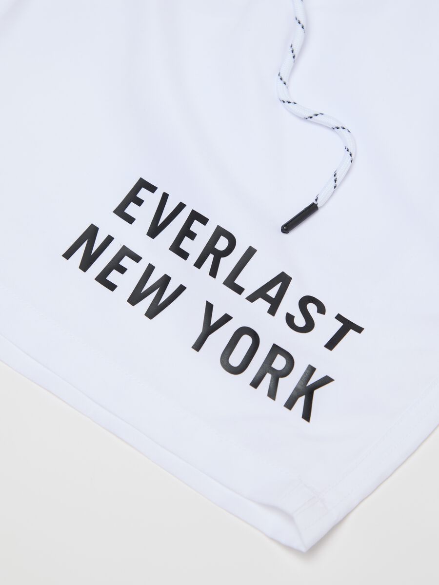 White swimming trunks with logo print_1