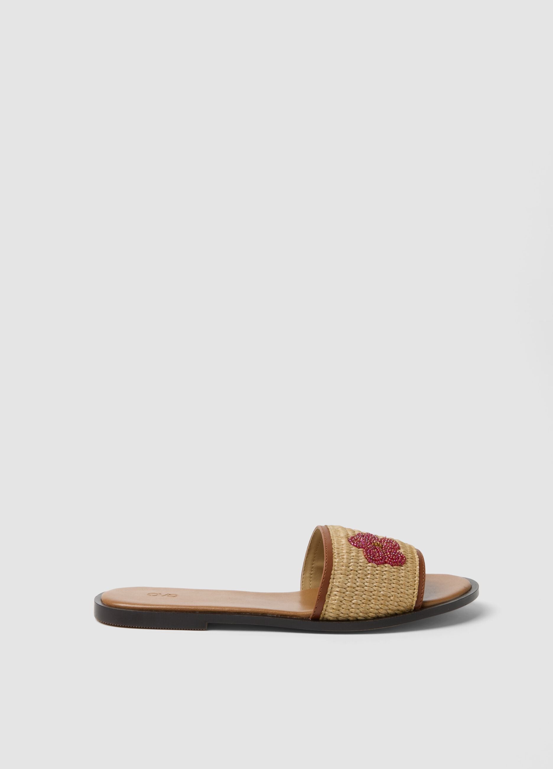 Beige flat sandals with braided embroidered strap