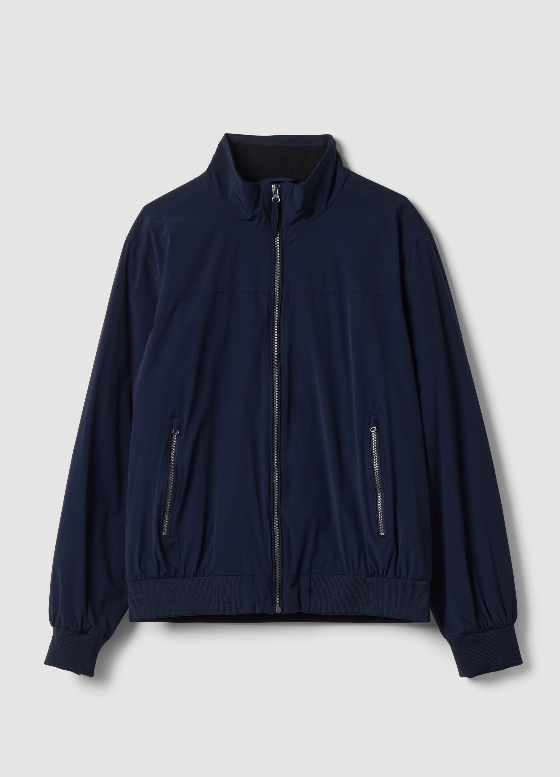 Giubbotto blu in tessuto elasticizzato con zip