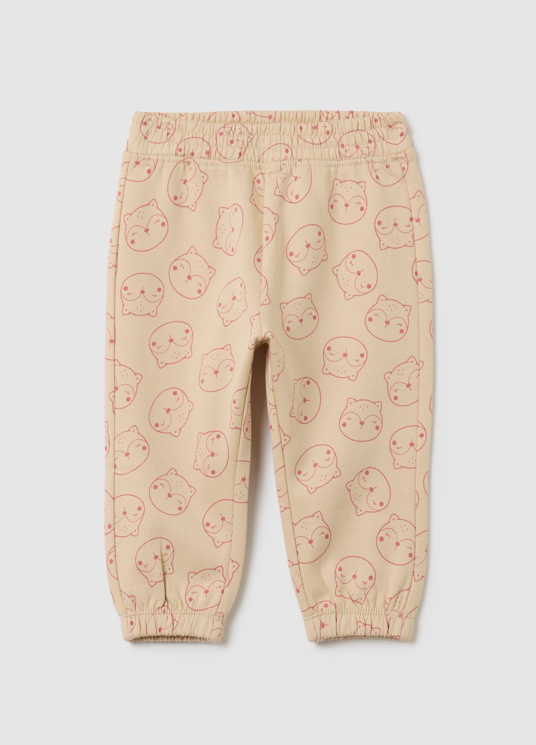 Girls' beige cotton joggers with print
