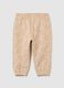 Girls' beige cotton joggers with print_0