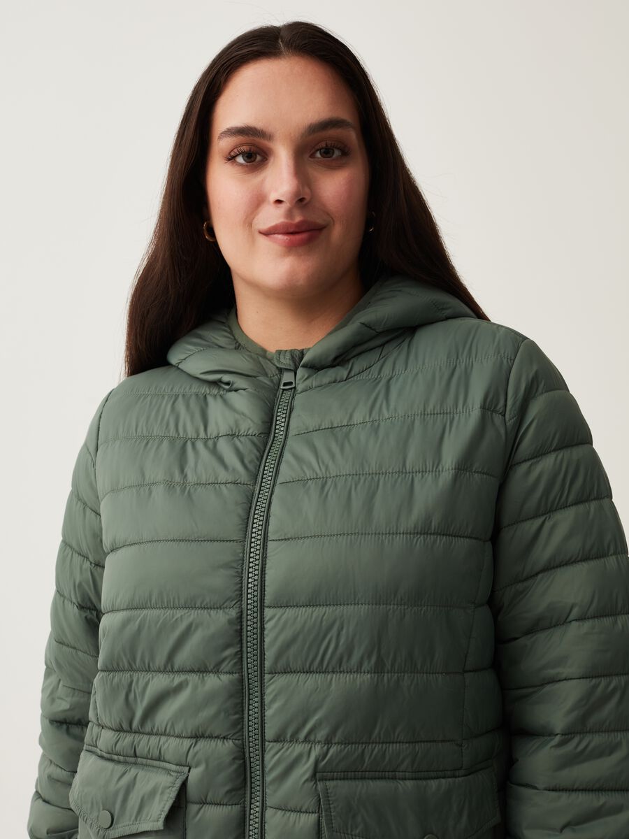 Piumino ultralight con cappuccio Curvy_1