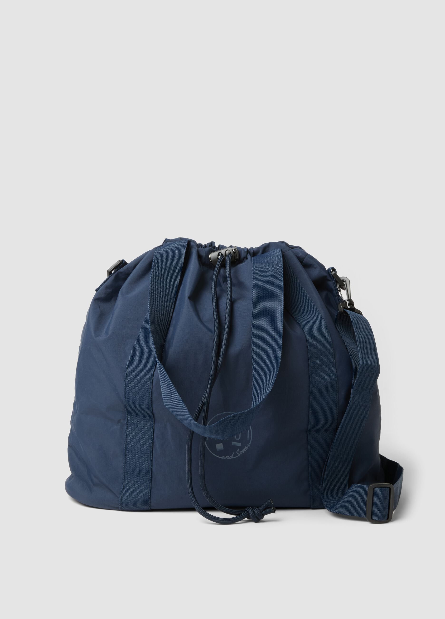 Blue drawstring travel bag