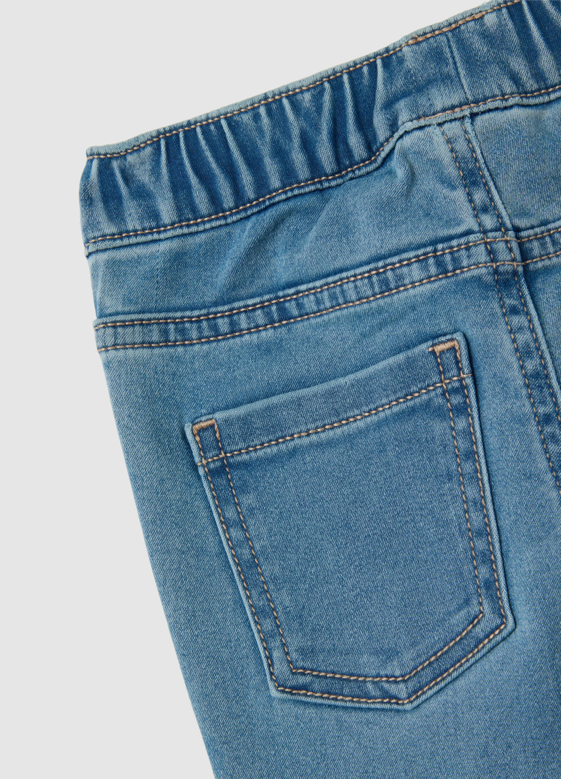 Girls' blue denim flare jeans with rhinestone hearts