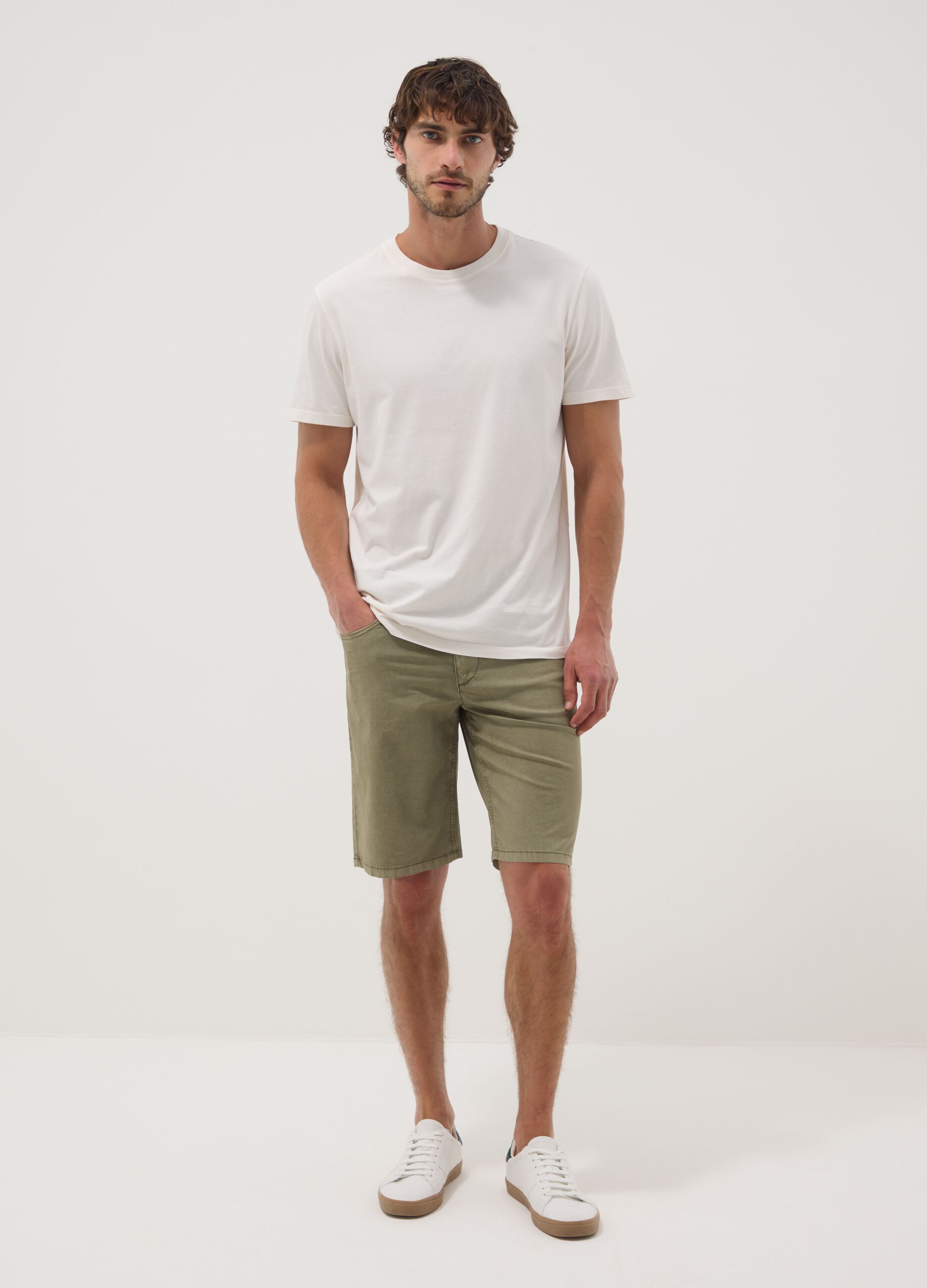Green stretch cotton five-pocket Bermuda shorts