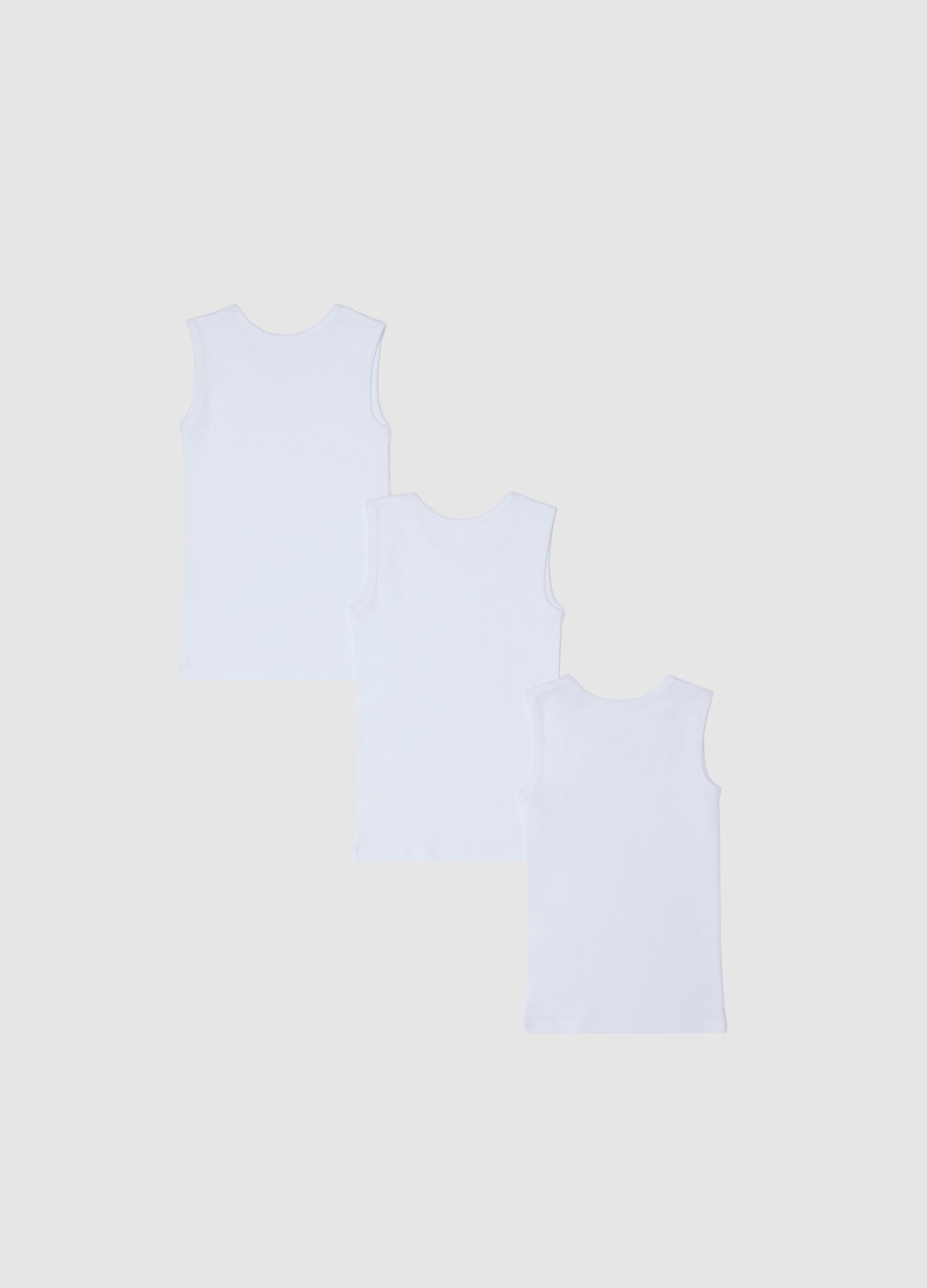 Three-pack white racerback vests in organic cotton