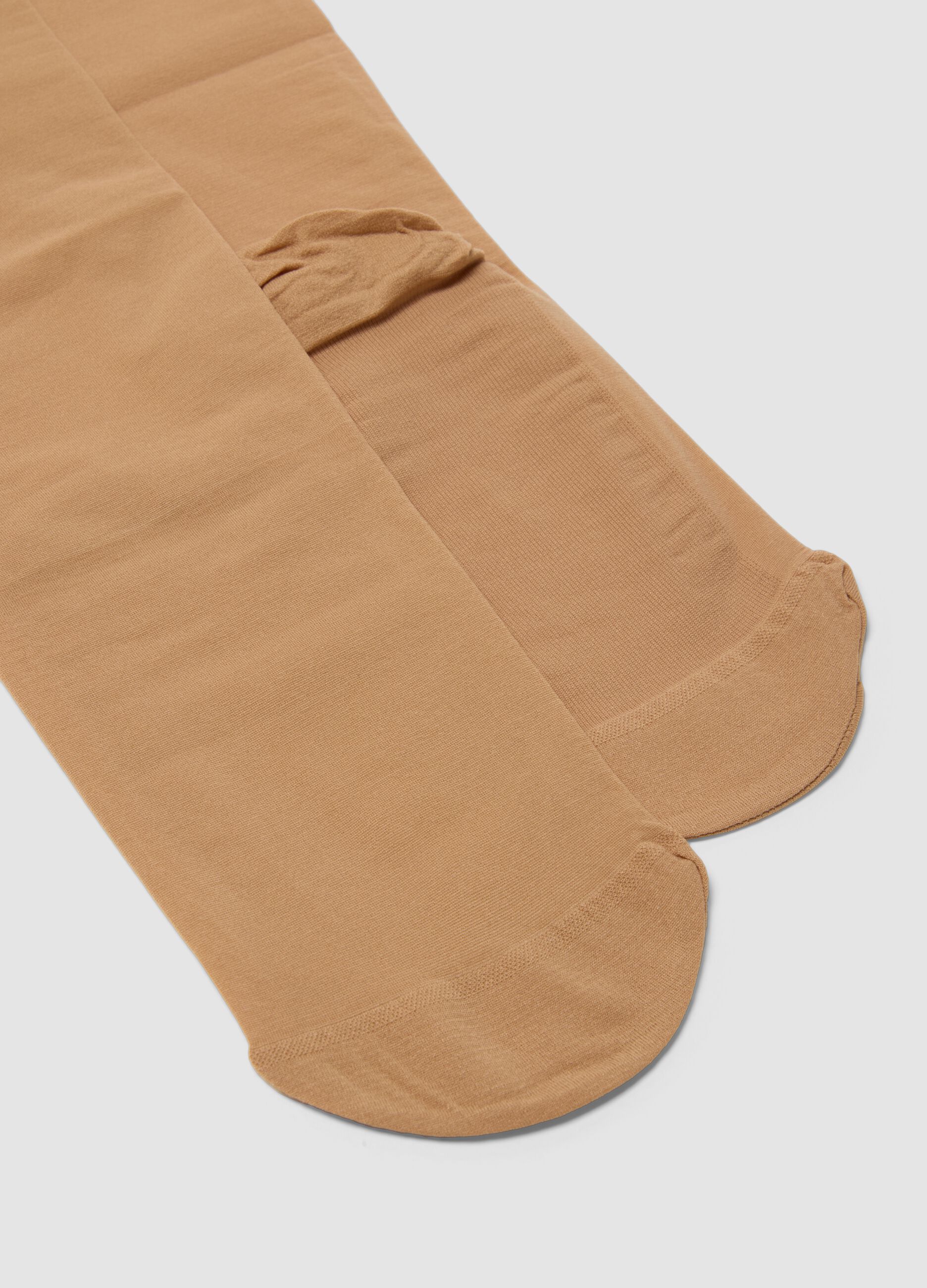 Beige space-saving socks in stretch fabric
