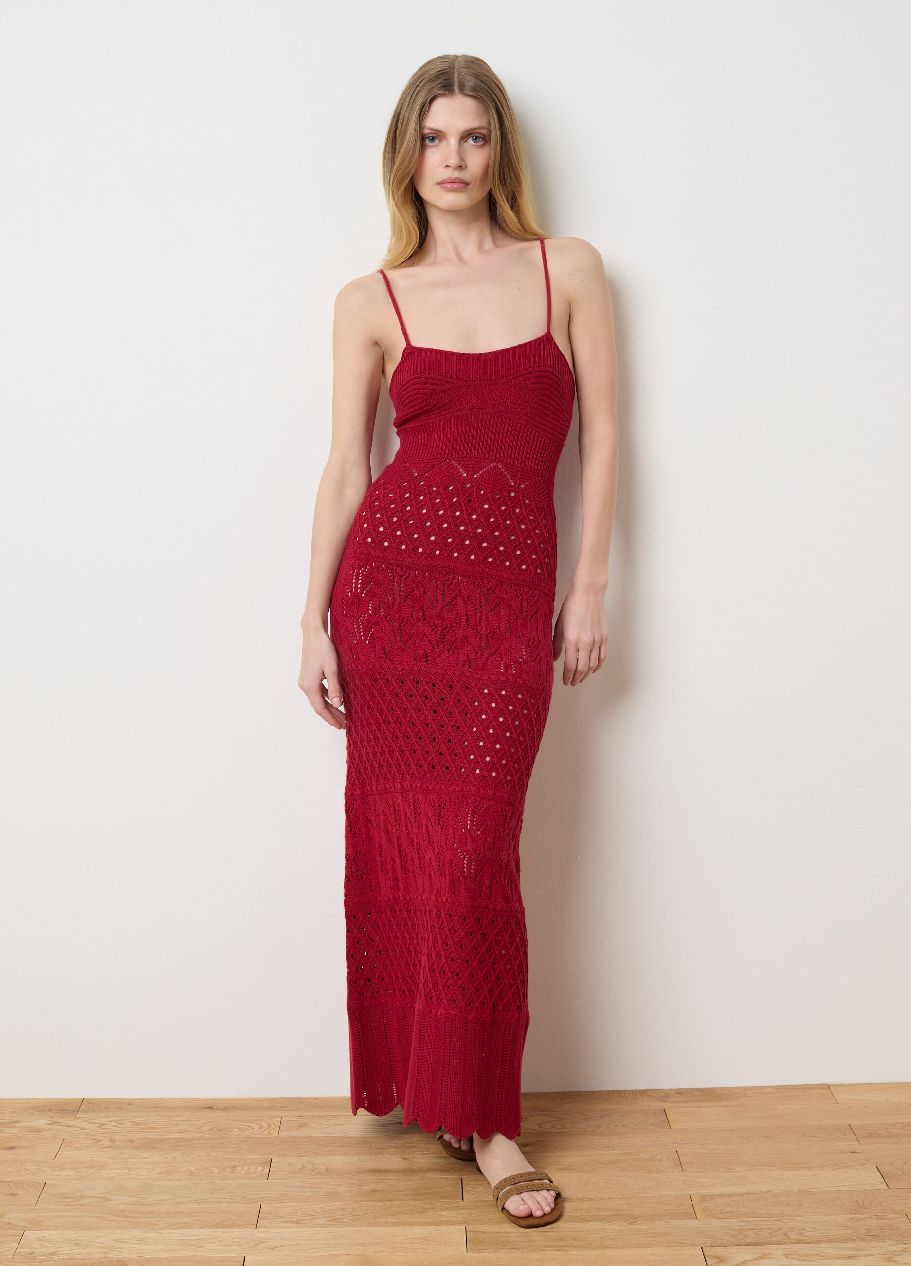 Long red dress in crochet knit