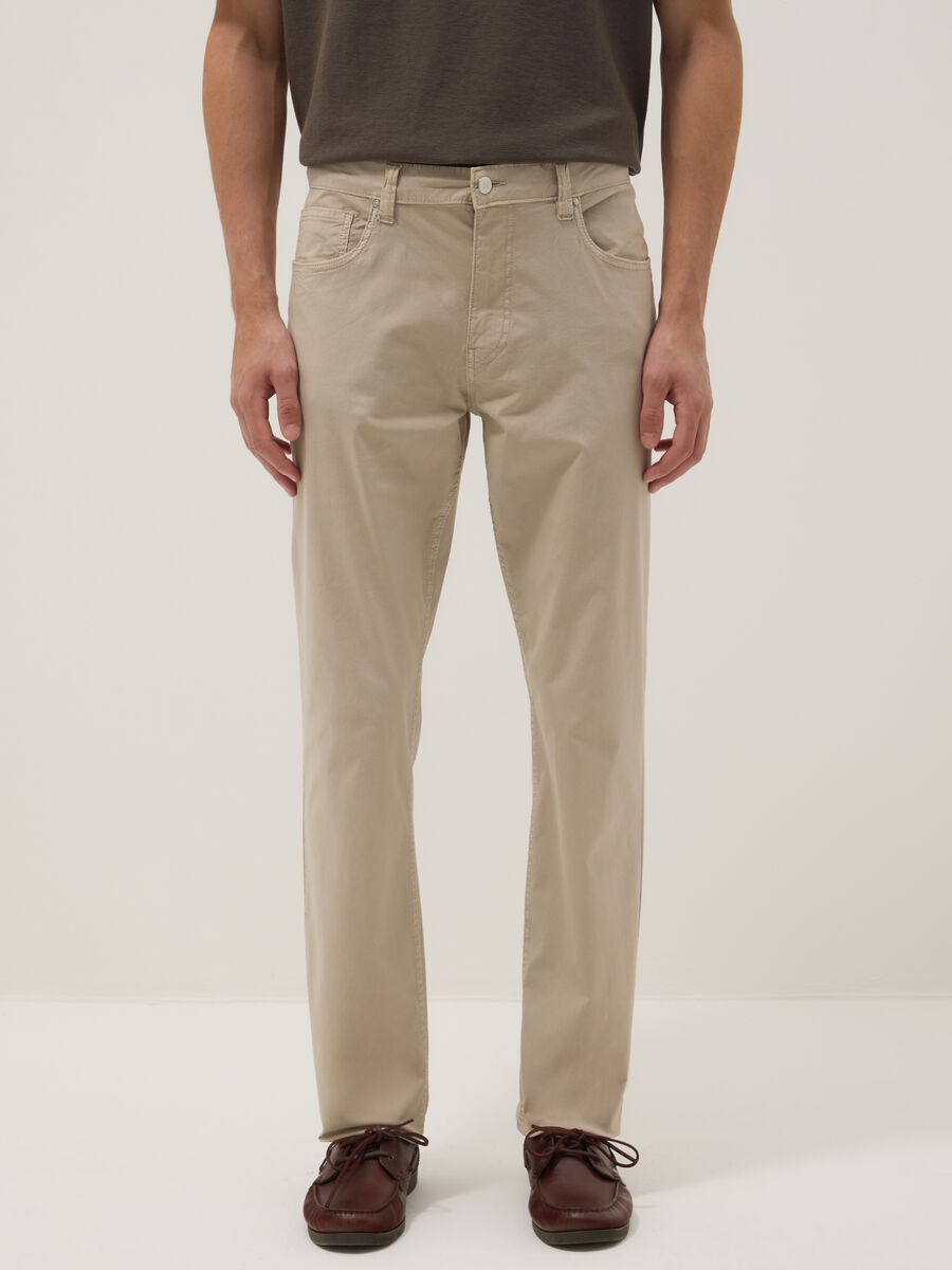 Pantaloni beige in cotone elasticizzato slim fit_1