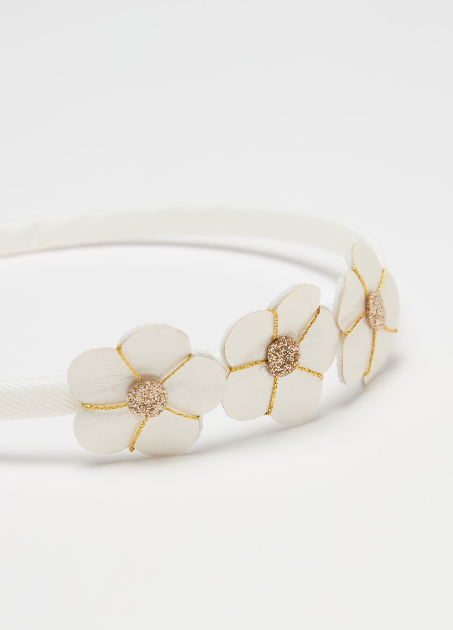 Alice band with appliqué flowers
