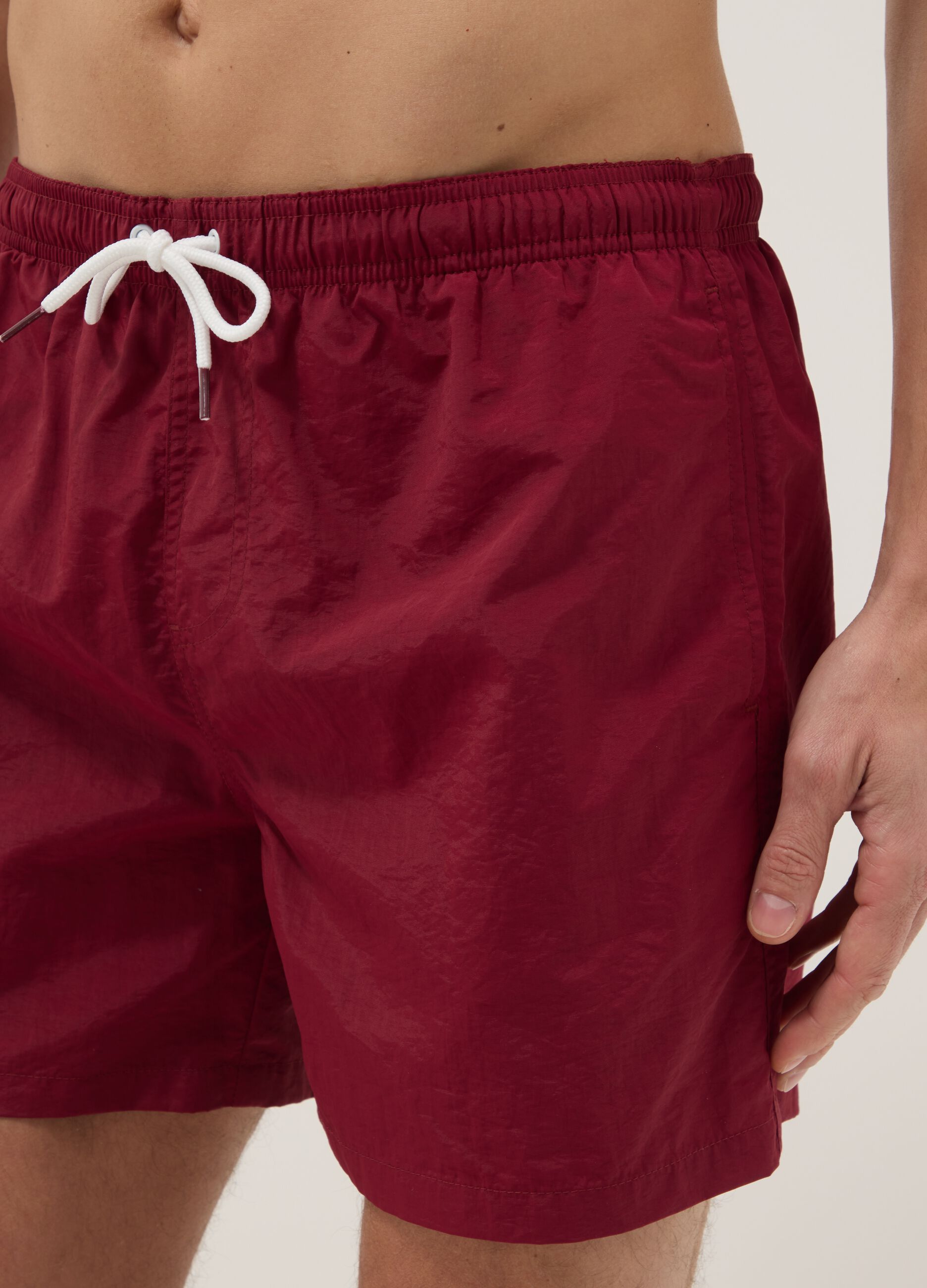 Red regular-fit swim shorts with drawstring