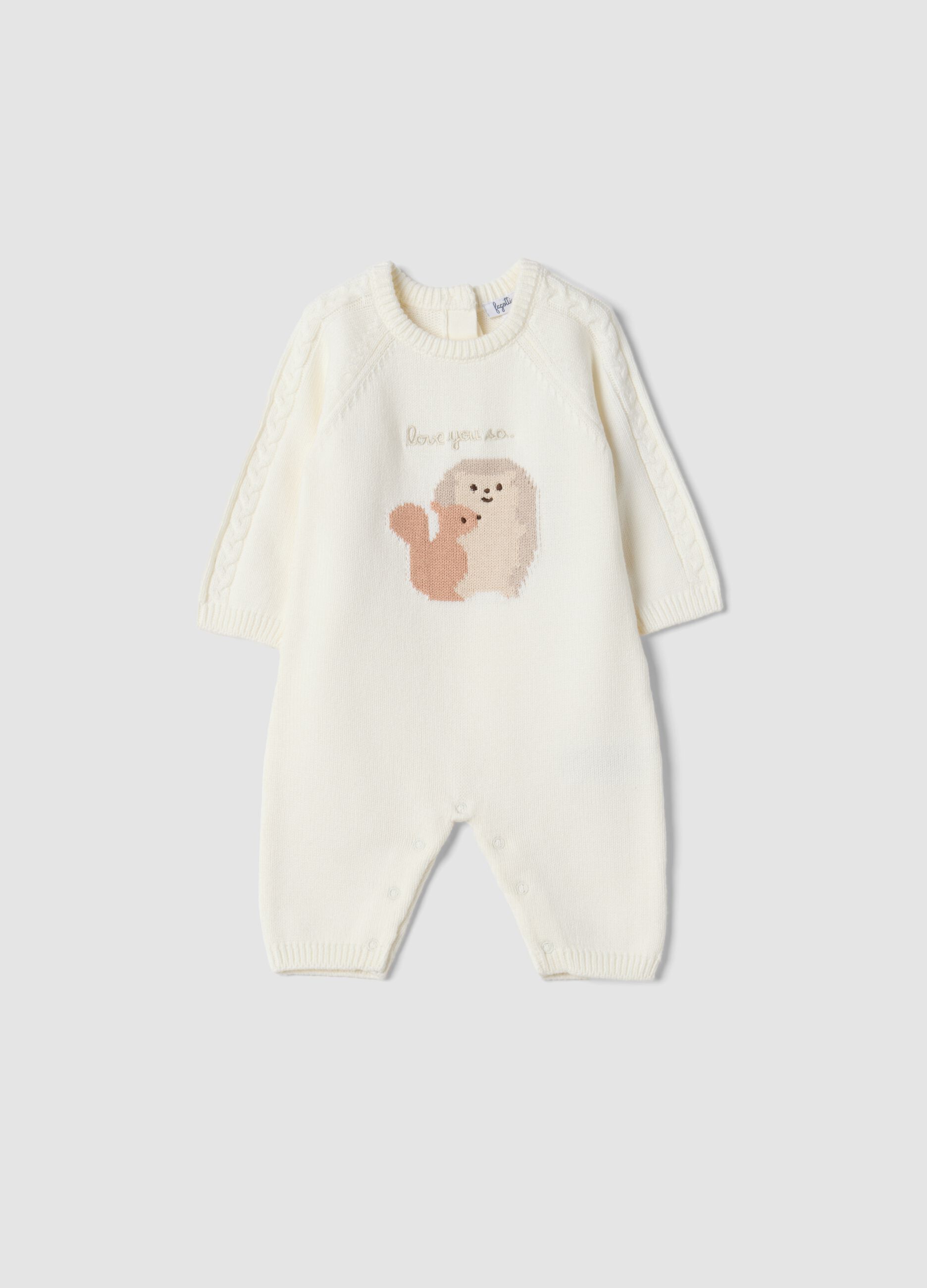 White 100% organic cotton baby sleepsuit with animal print