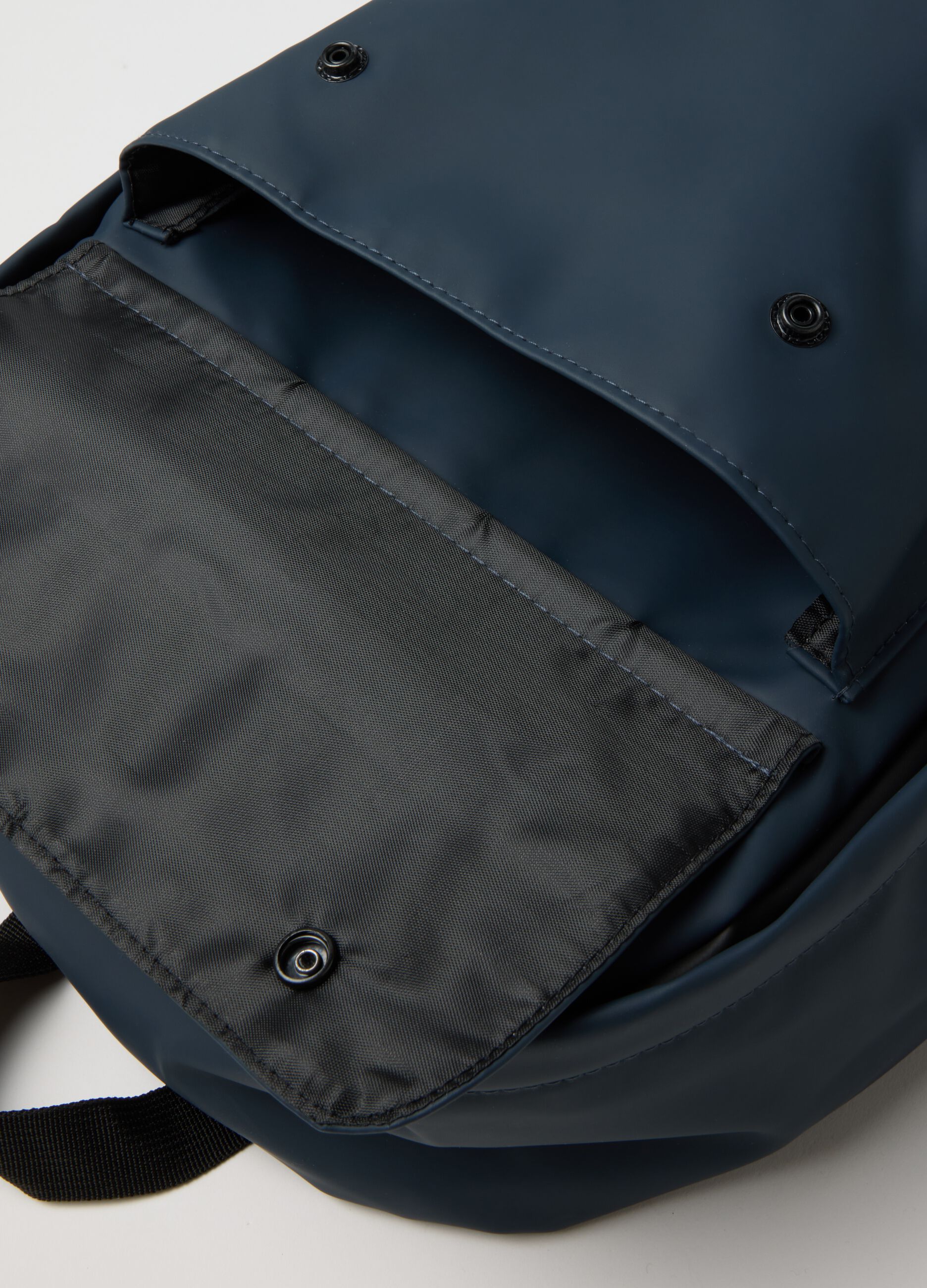 Blue backpack with adjustable straps and front pocket