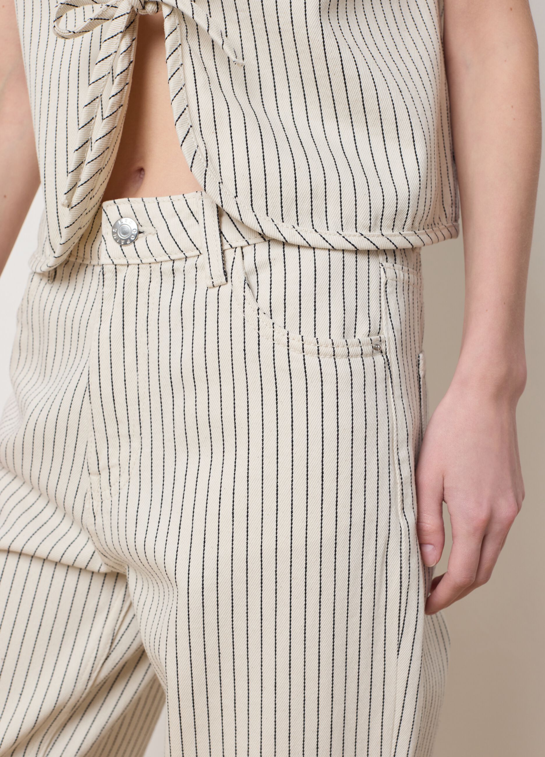 Carrot fit pinstripe jeans.