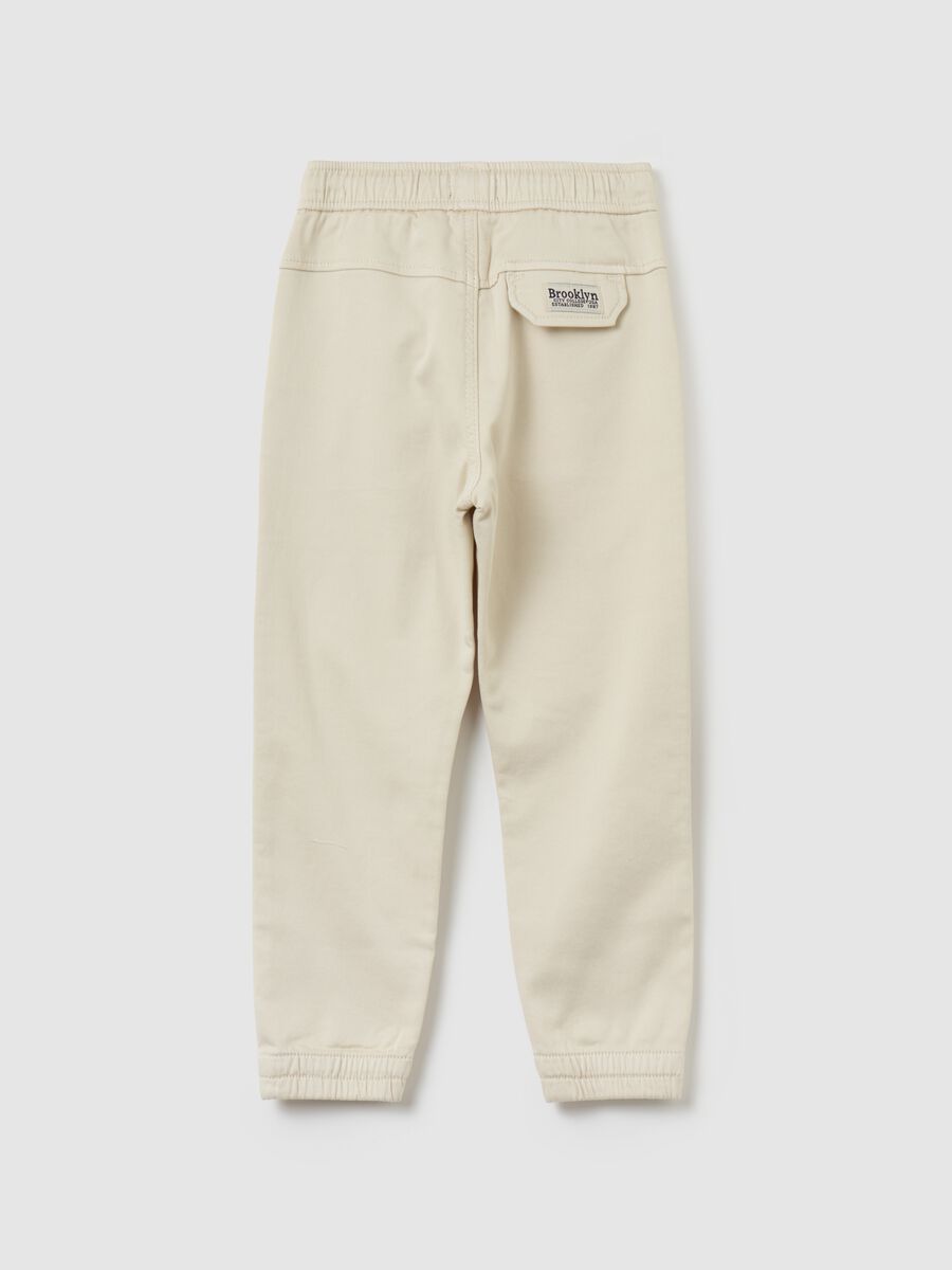Joggers in cotone stretch con coulisse_1