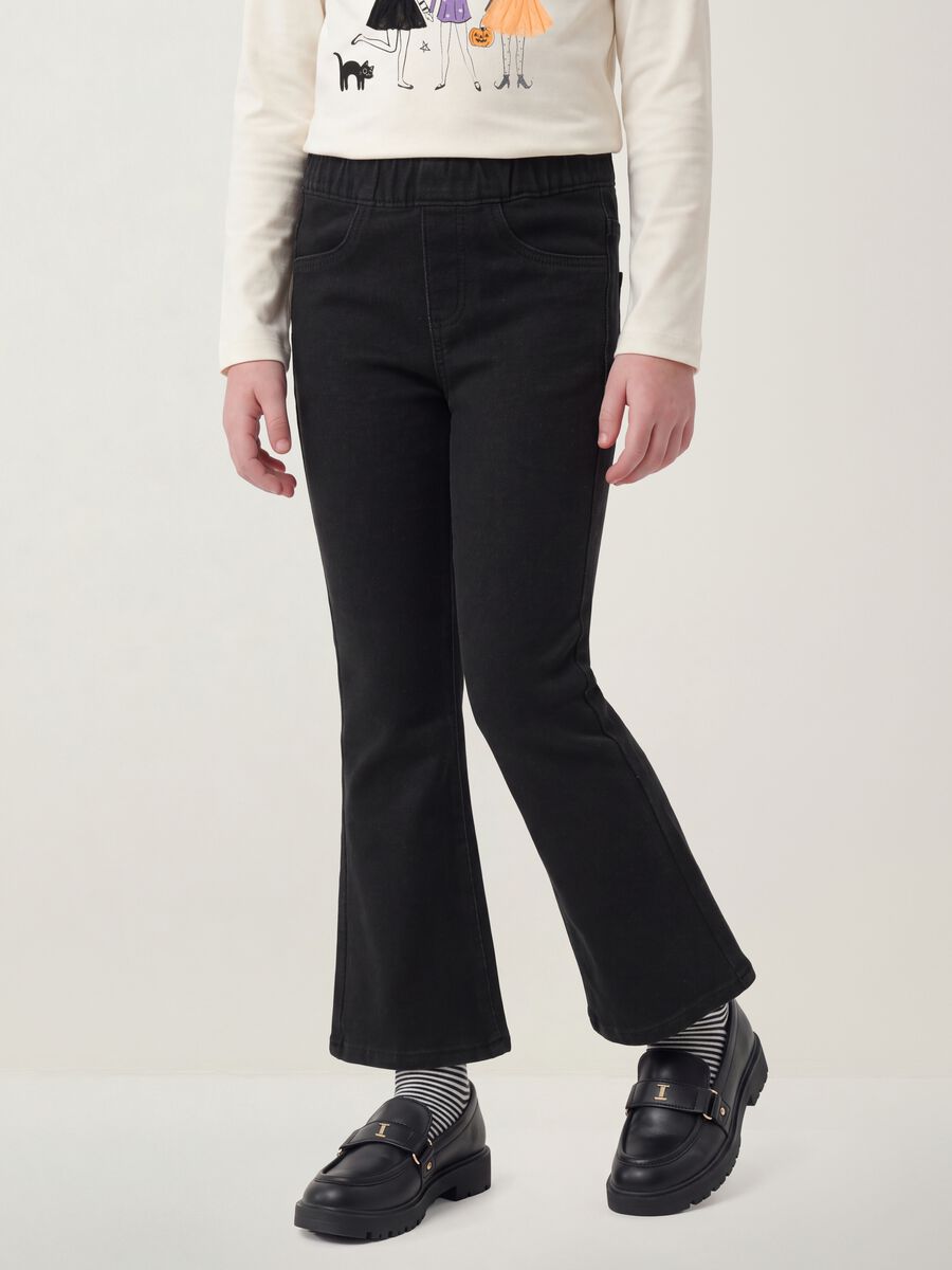 Jeggings nero flare in cotone elasticizzato per bambina_1