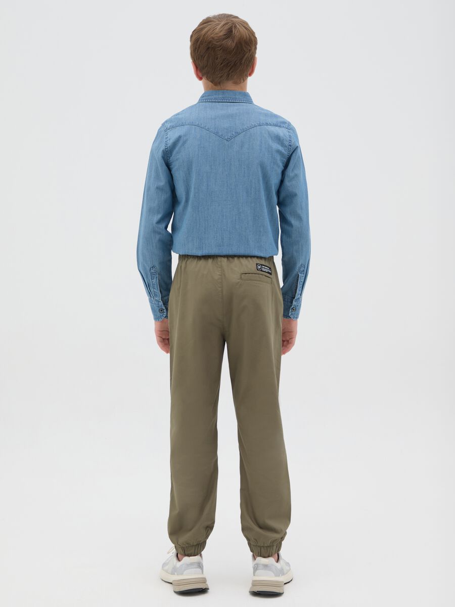 Boys’ trousers in 100% green cotton._2