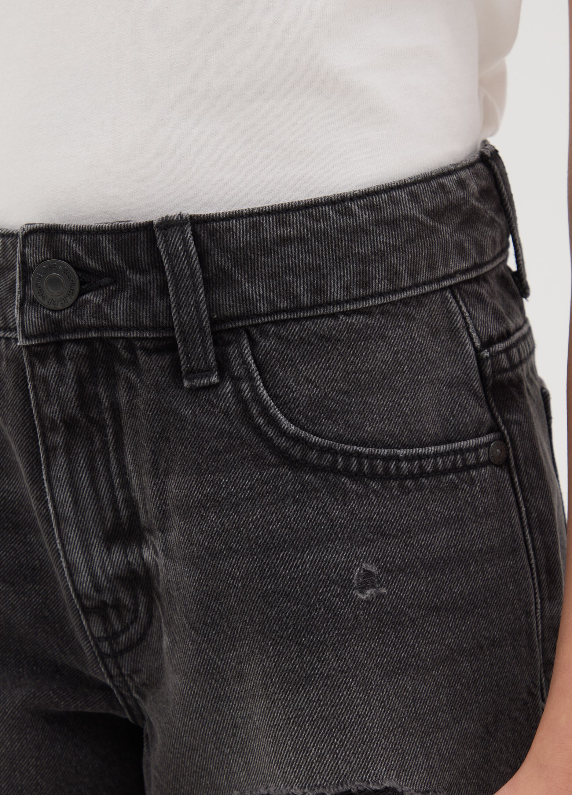Black denim shorts with a ripped effect