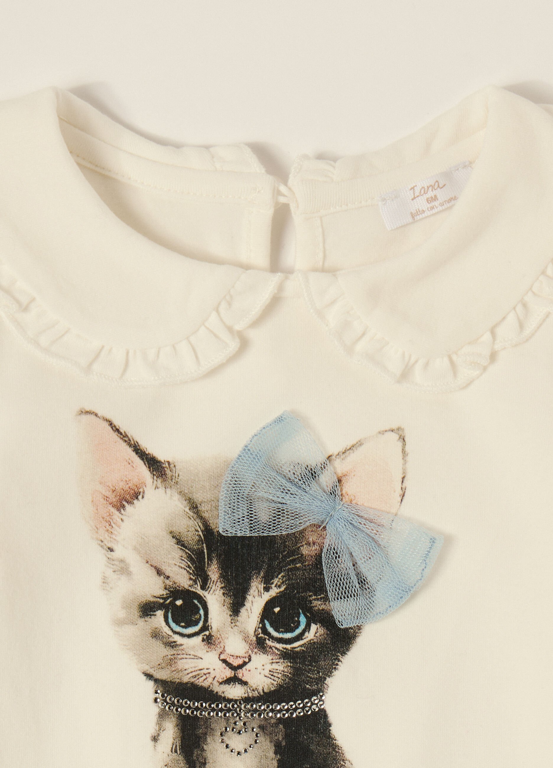 White long-sleeve top with cat print