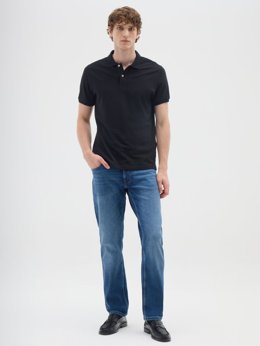 Jeans blu in denim elasticizzato_0