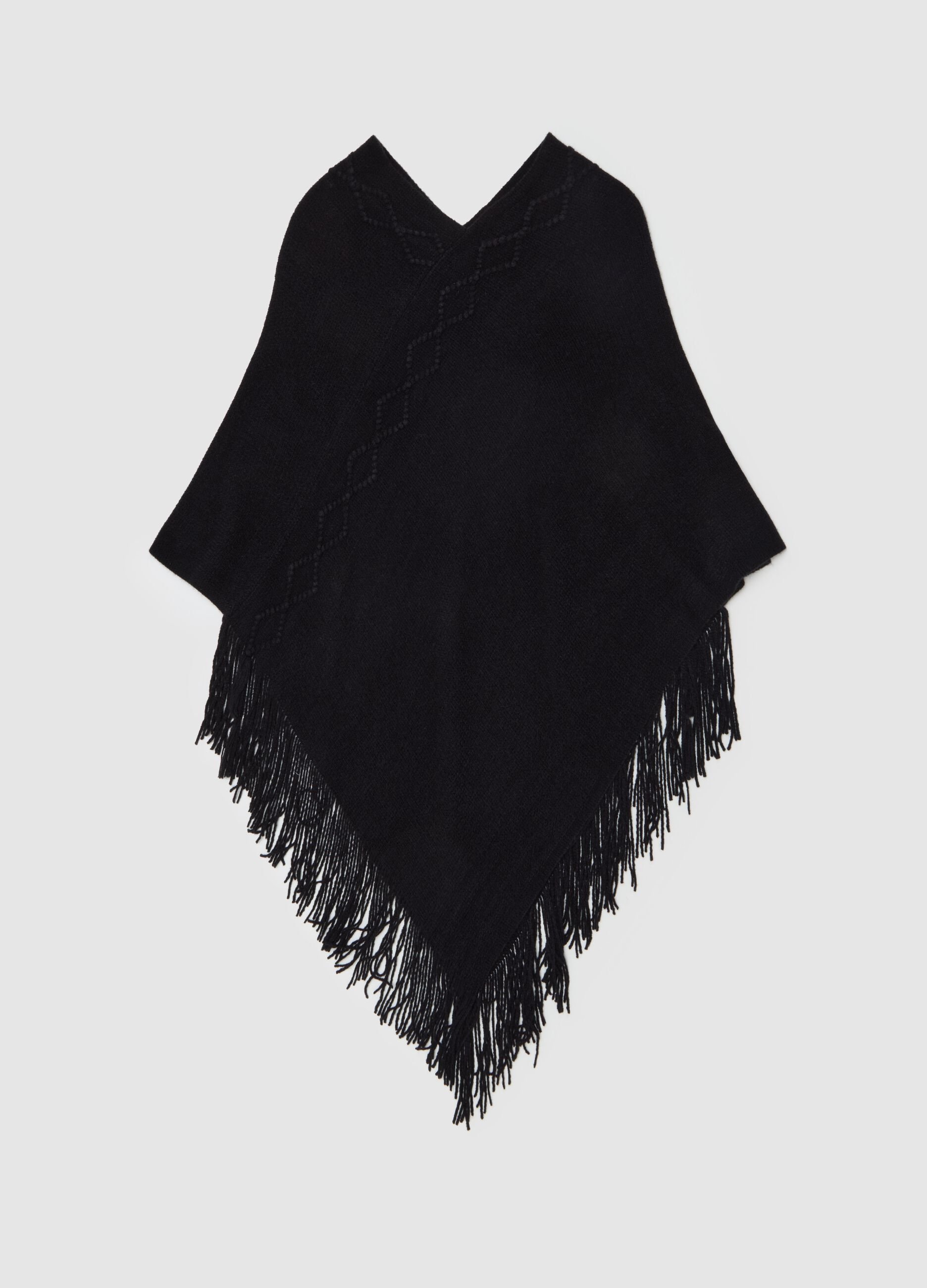 Poncho con lavorazione a rombi e frange