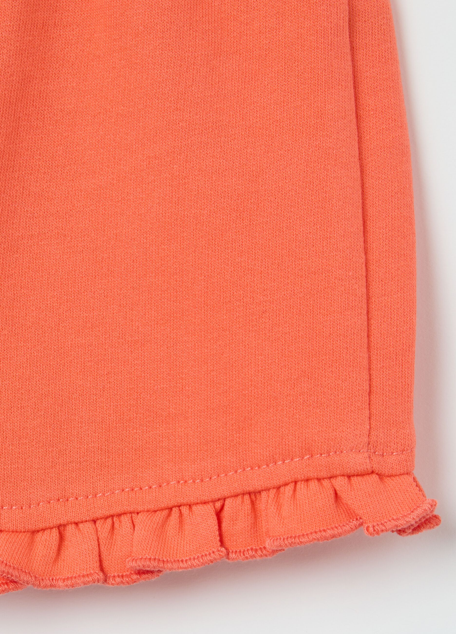 Orange shorts with cotton frills