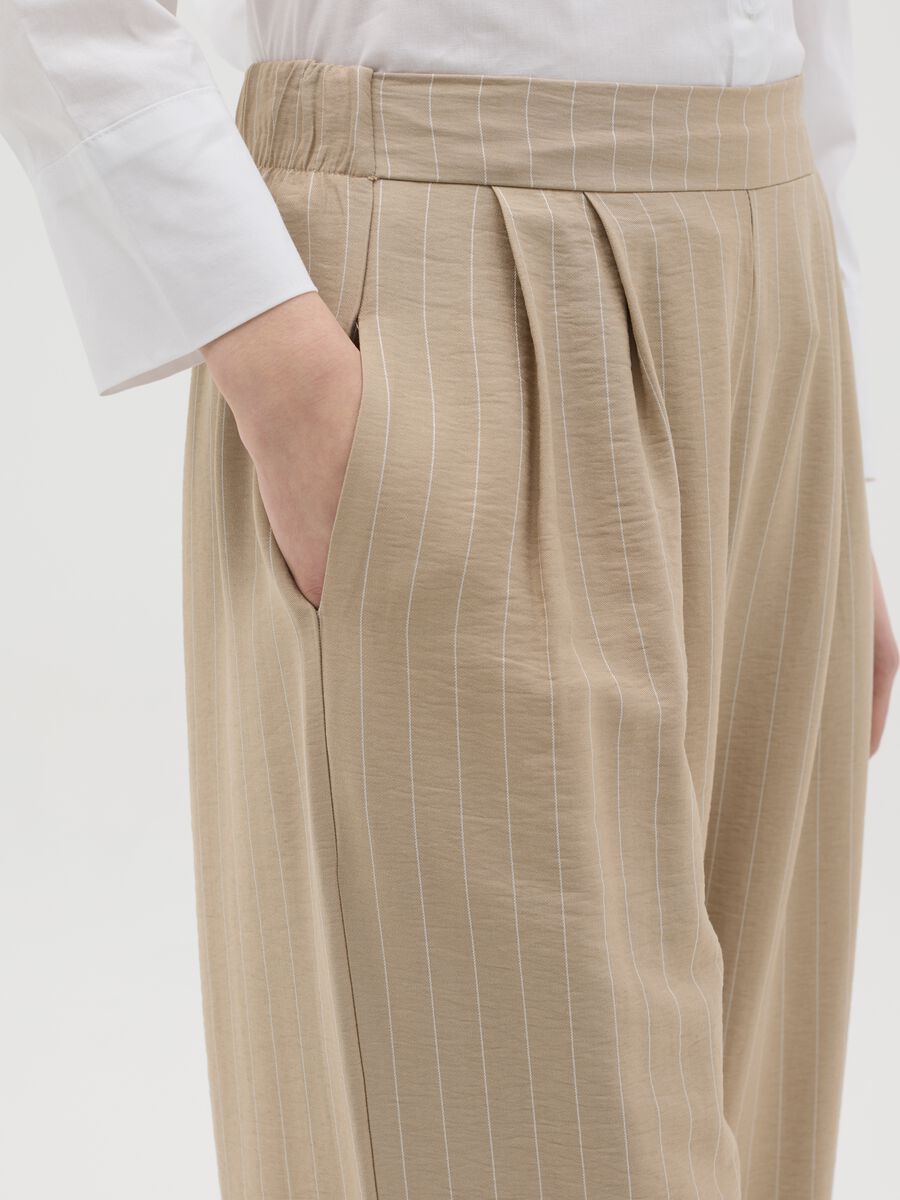 Beige palazzo trousers with striped pattern_3