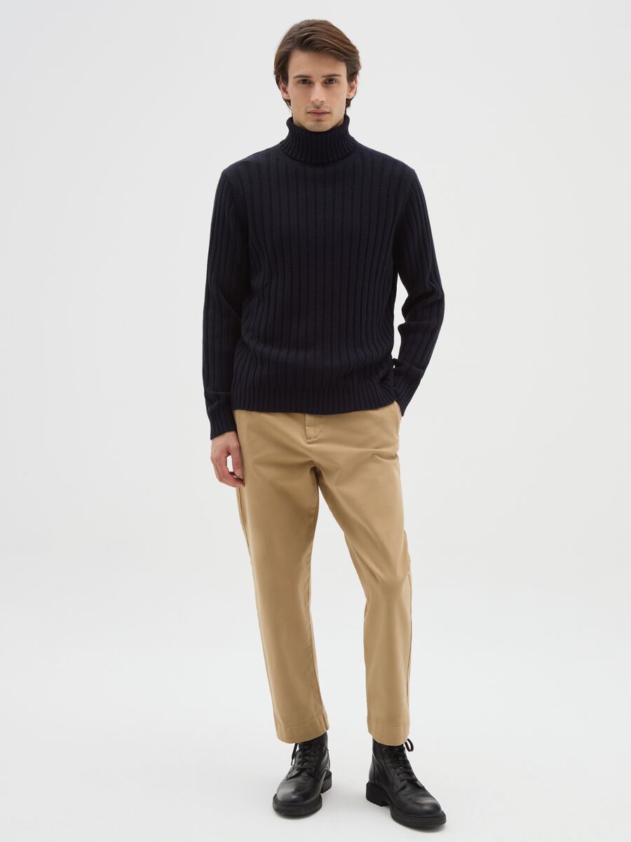 Beige stretch cotton carrot fit trousers_0