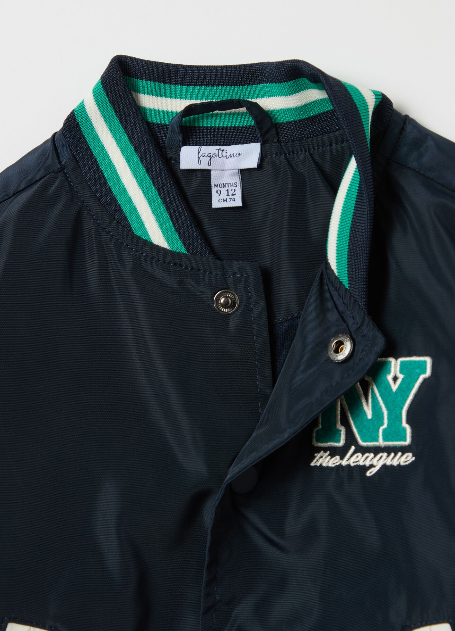 Varsity bomber jacket with "NY the league" patch