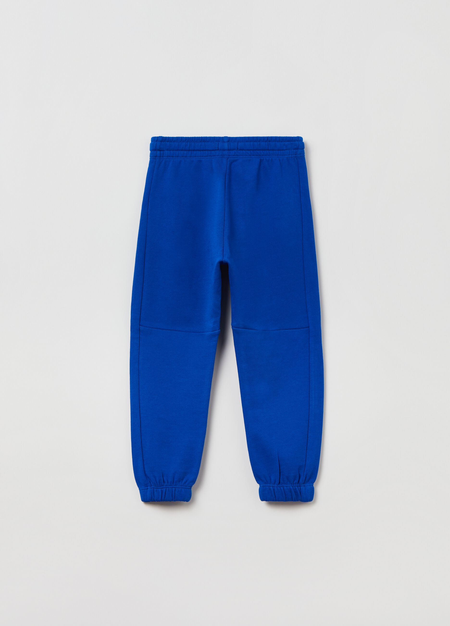 Solid colour cotton joggers with drawstring.