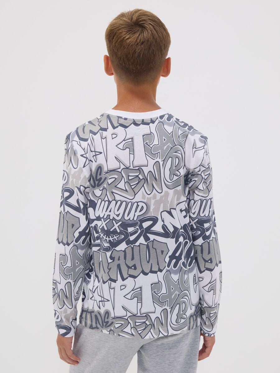 T-shirt bianca in puro cotone organico con graffiti per ragazzo relaxed fit_2